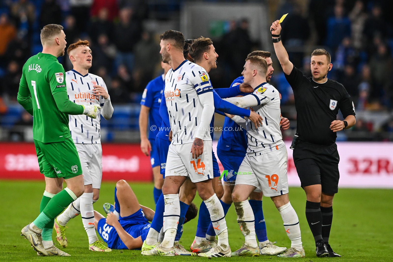 Gary Madine #14 of Blackpool is given a yellow card during the Sky Bet Championship match Cardiff City vs Blackpool at Cardiff City Stadium, Cardiff, United Kingdom, 17th December 2022

(Photo by Craig Thomas/News Images)