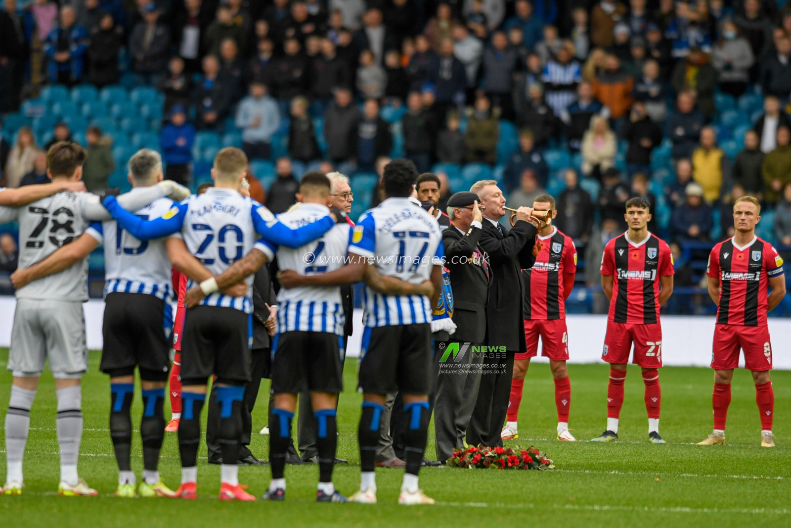 The Last Post is played before the game at Hillsborough