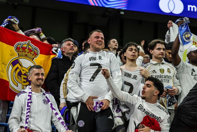 Real Madrid fans celebrate as Vinicius Junior of Real Madrid scores to make it 1-2 during the UEFA Champions League last 16 second leg match Manchester City vs Real Madrid at The City of Manchester Stadium, Manchester, United Kingdom on 17 March 2026

(Photo by Mark Cosgrove/News Images)