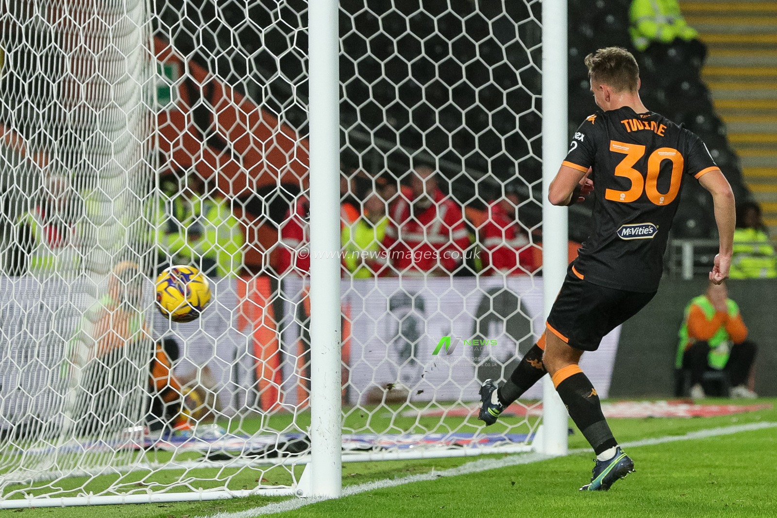 Scott Twine #30 of Hull City taps the ball into an empty net and makes it 3-0 in the first half of the Sky Bet Championship match Hull City vs Rotherham United at MKM Stadium, Hull, United Kingdom, 28th November 2023

(Photo by James Heaton/News Images)
