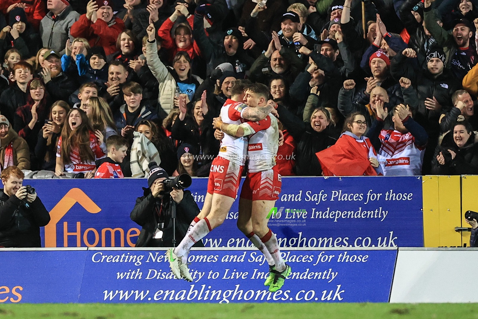 Tommy Makinson #2 of St Helens celebrates his try