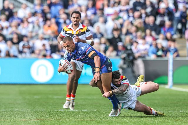 Corey Hall of Wakefield Trinity is tackled by Andy Ackers of Bradford Bulls during the Betfred Super League round 8 match Wakefield Trinity vs Bradford Bulls at DIY Kitchens Stadium, Wakefield, United Kingdom on 18 April 2026

(Photo by Alfie Cosgrove/News Images)