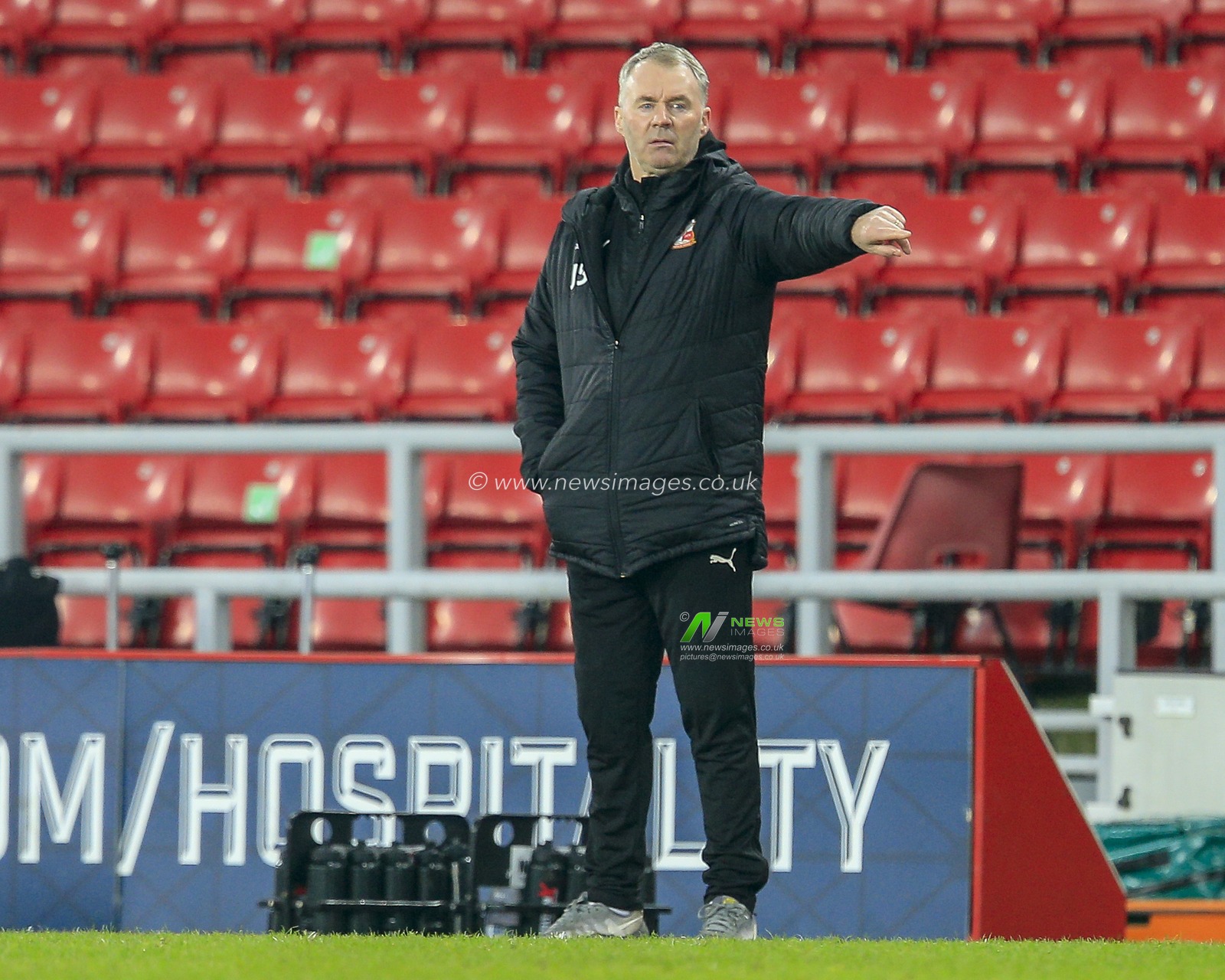 John Sheridan, Manager of Swindon Town, gives his team instructions
