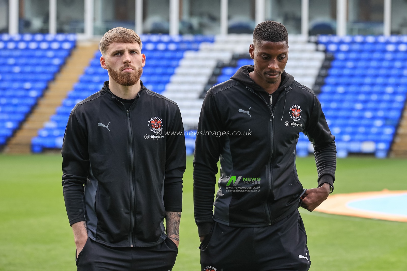 Daniel Grimshaw #32 of Blackpool and Marvin Ekpiteta #21 of Blackpool arrives at The Weston Homes Stadium