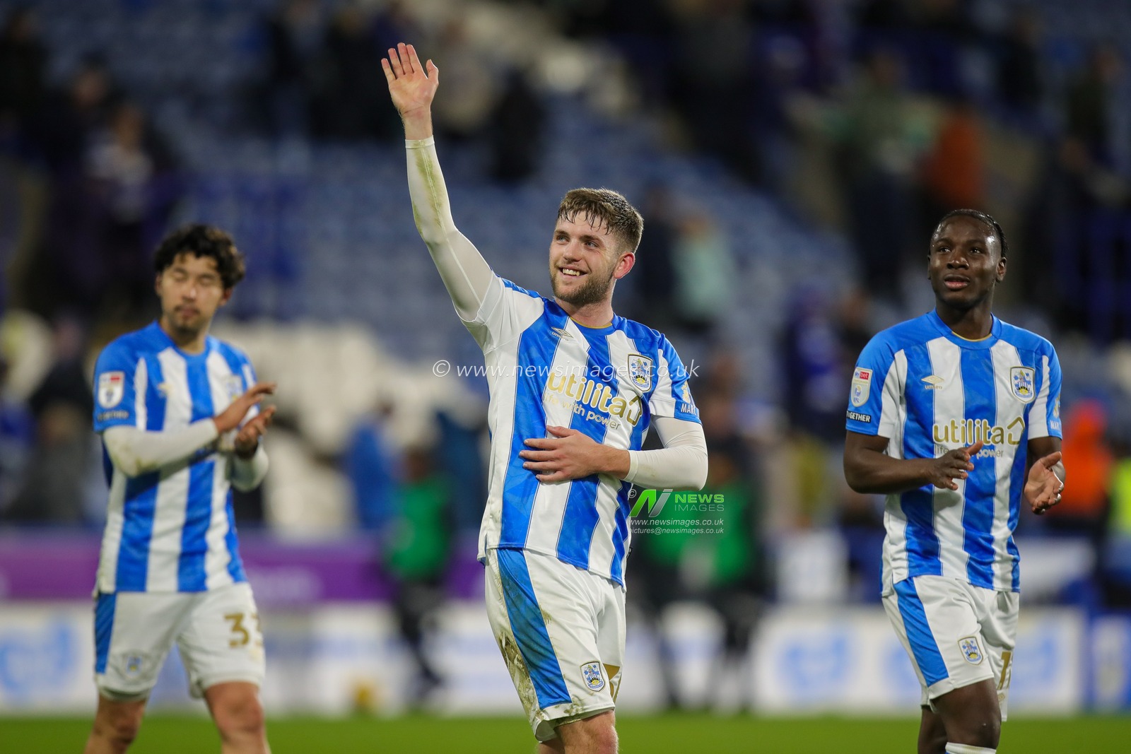 Ben Jackson #30 of Huddersfield Town celebrates the win and waves to the fans at full time after the Sky Bet Championship match Huddersfield Town vs Southampton at John Smith's Stadium, Huddersfield, United Kingdom, 25th November 2023

(Photo by James Heaton/News Images)