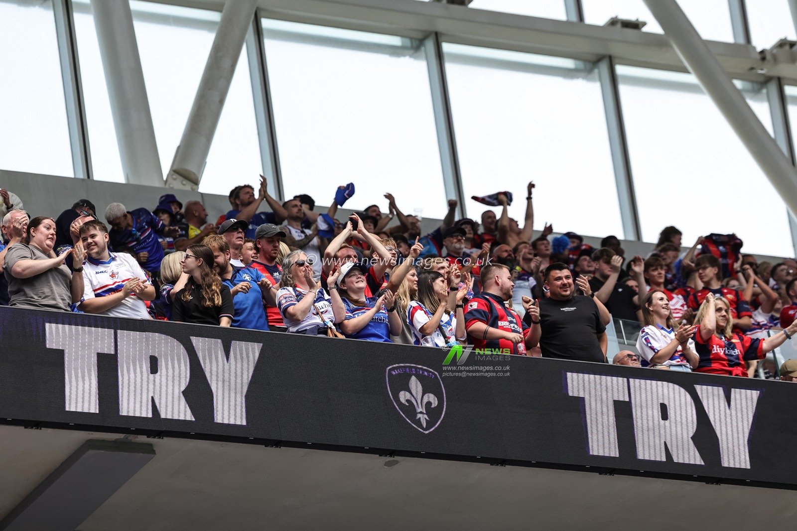 Wakefield fans celebrate the try of Cameron Scott of Wakefield Trinity (not pictured) during the Betfred Super League Magic Weekend match Wakefield Trinity vs Castleford Tigers at Hill Dickinson Stadium, Liverpool, United Kingdom on 05 July 2026

(Photo by Mark Cosgrove/News Images)