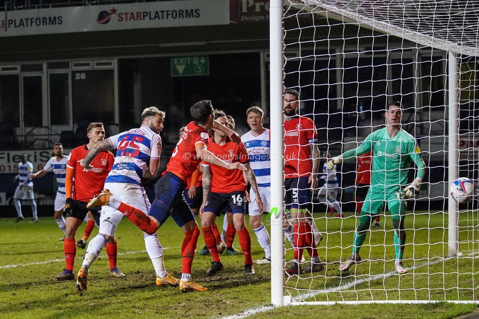 Charlie Austin #45 of Queens Park Rangers scores to make it 0-1