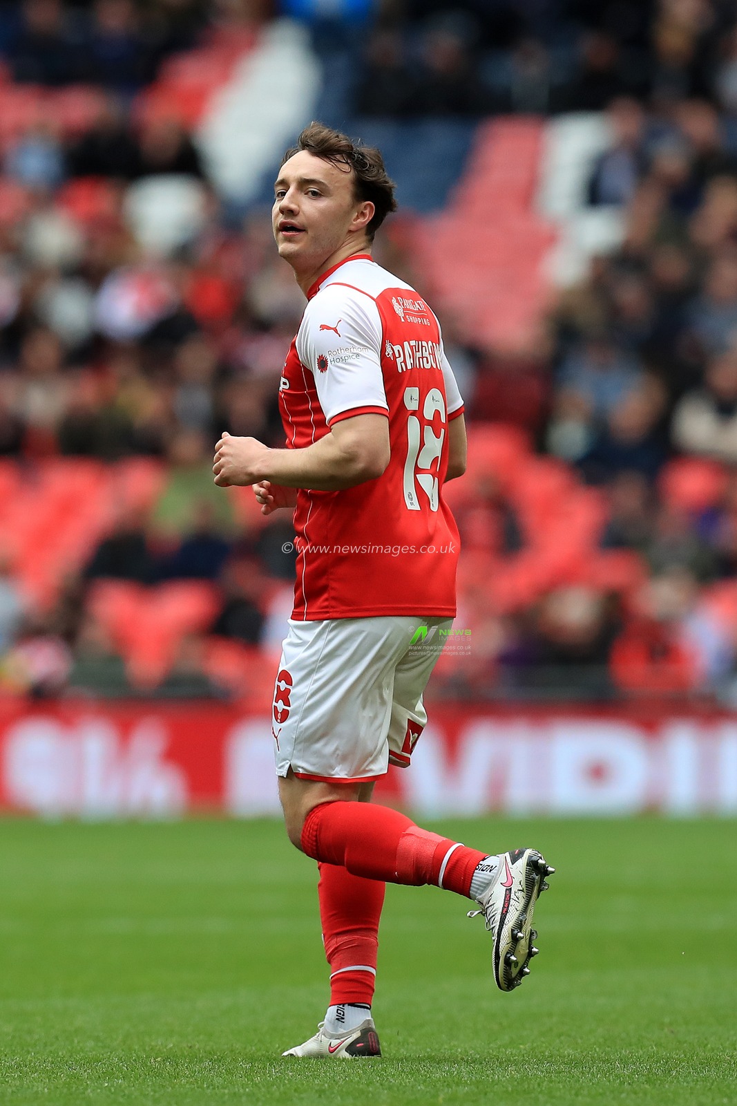 Ollie Rathbone #18 of Rotherham United in action.