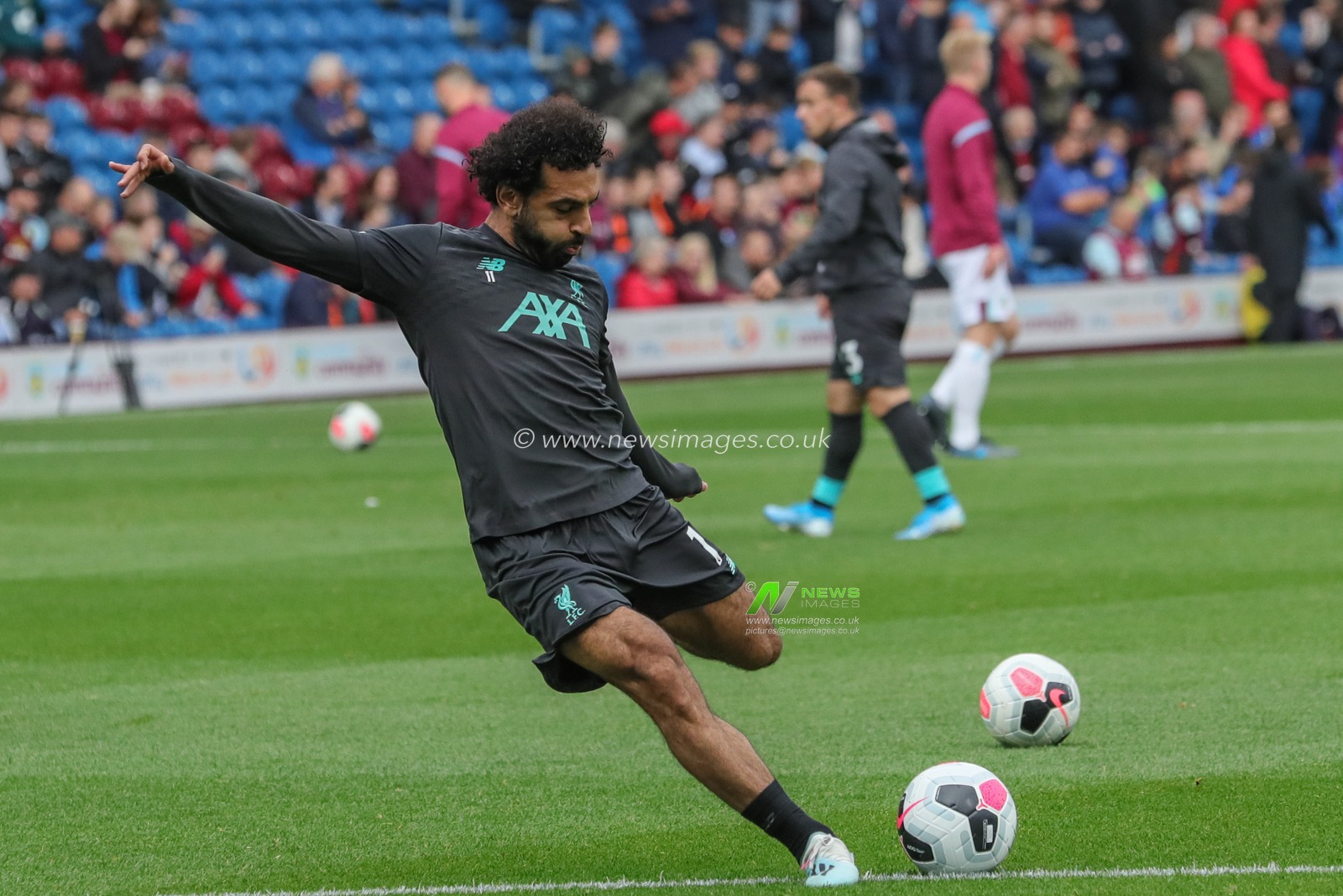 31st August 2019, Turf Moor, Burnley, England ; Premier League Football, Burnley vs Liverpool : Mohamed Salah (11) of Liverpool warming up

Credit: Mark Cosgrove/News Images

English Football League images are subject to DataCo Licence