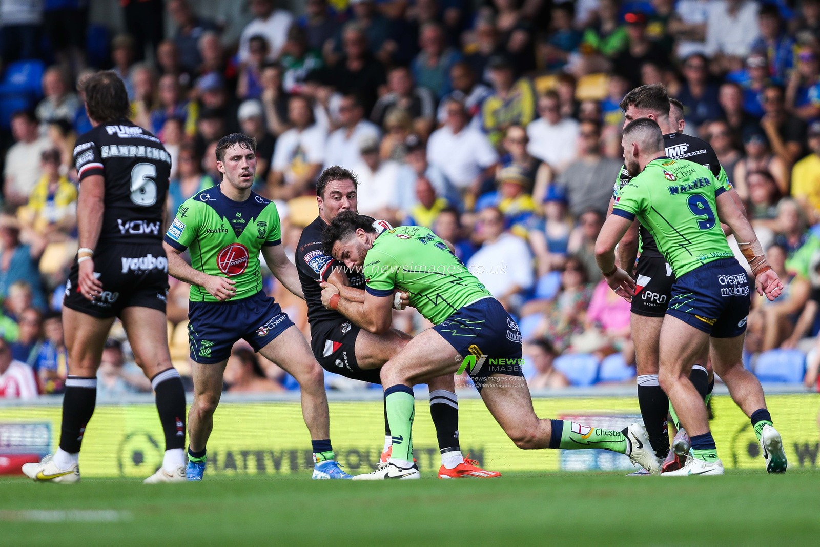 Max Wood of Warrington Wolves makes a tackle during the Betfred Super League Round 21 match London Broncos vs Warrington Wolves at Plough Lane, Wimbledon, United Kingdom, 11th August 2024

(Photo by Izzy Poles/News Images)