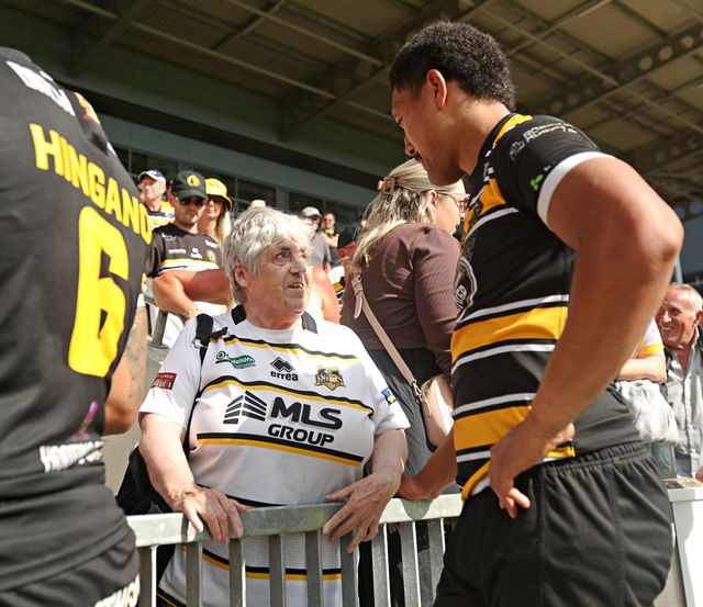 Toa Mata'Afa of York Knights RLFC with a fan after the Betfred Championship match York City Knights vs Featherstone Rovers at LNER Community Stadium, York, United Kingdom, 29th June 2025

(Photo by Sam Eaden/News Images)