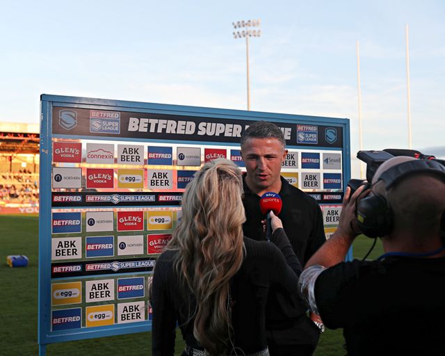 Sam Burgess, head coach of Warrington Wolves  is interviewed by Sky Sports before the Betfred Super League round 27 match Hull KR vs Warrington Wolves at Sewell Group Craven Park, Kingston upon Hull, United Kingdom, 18th September 2025

(Photo by Sam Eaden/News Images)