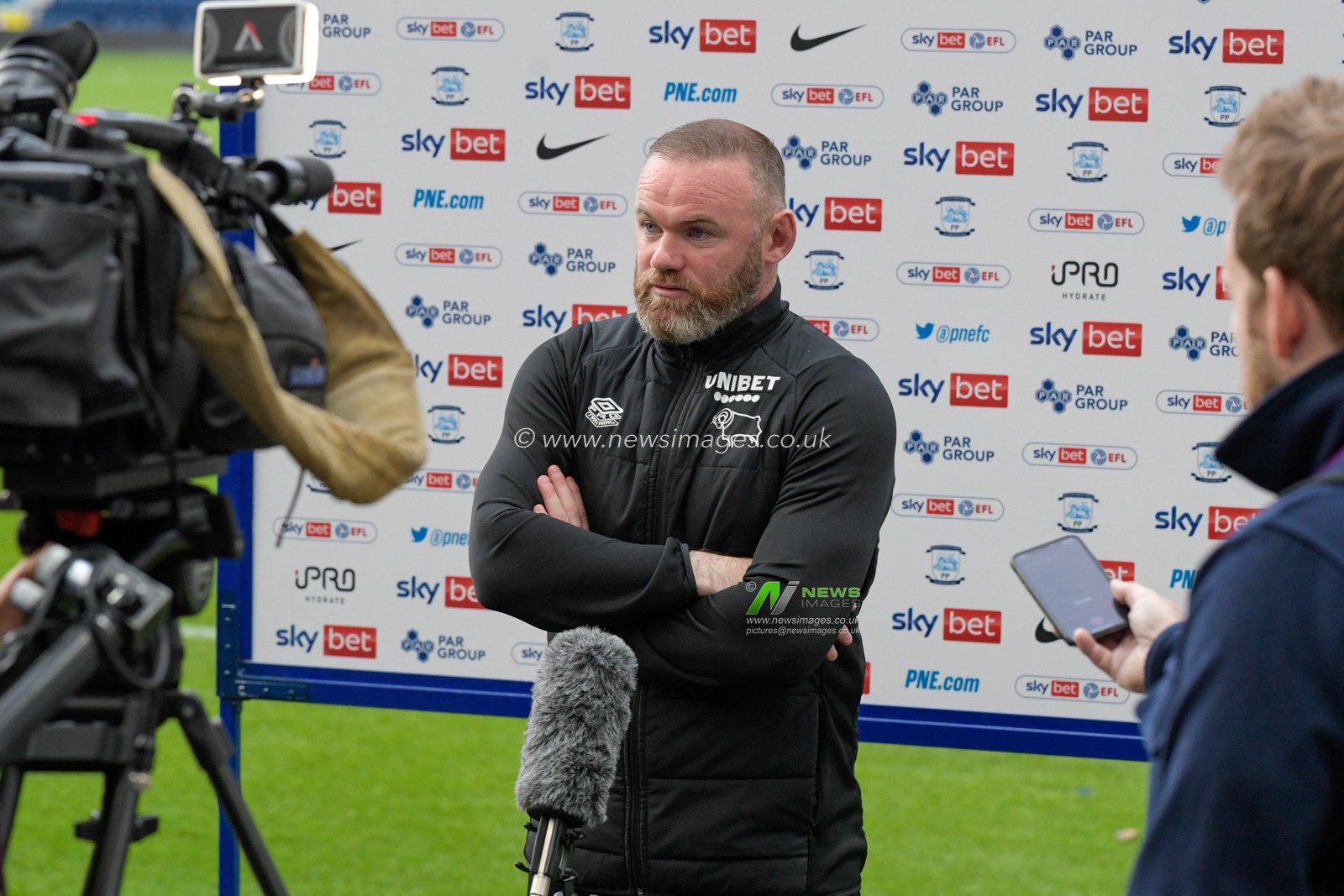 Wayne Rooney manager of Derby County speaks to the media after the game