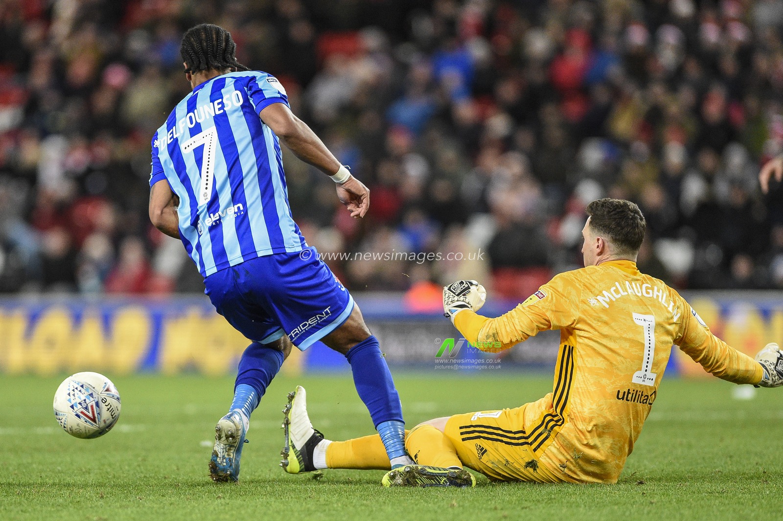 14th December 2019, Stadium Of Light, Sunderland, England; Sky Bet League 1, Sunderland v Blackpool : Jon McLaughlin (1) of Sunderland slides out of his goal to beat Nathan Delfouneso (7) of Blackpool to the ball

Credit: Iam Burn/News Images