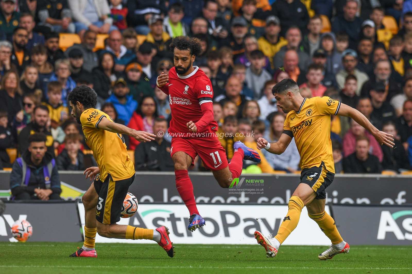 Rayan AÃ¯t-Nouri #3 of Wolverhampton Wanderers  tackles Mohamed Salah #11 of Liverpool during the Premier League match Wolverhampton Wanderers vs Liverpool at Molineux, Wolverhampton, United Kingdom, 16th September 2023

(Photo by Mike Jones/News Images)