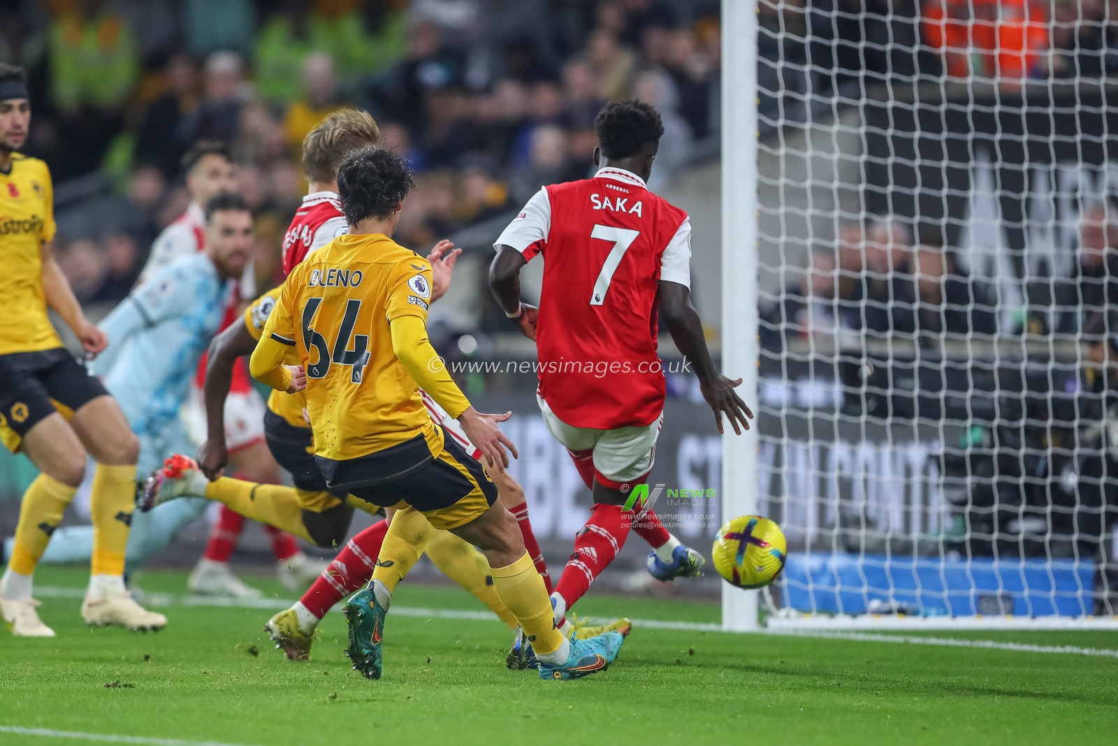 Martin Ã˜degaard #8 of Arsenal scores a goal to make it 0-1 during the Premier League match Wolverhampton Wanderers vs Arsenal at Molineux, Wolverhampton, United Kingdom, 12th November 2022

(Photo by Gareth Evans/News Images)