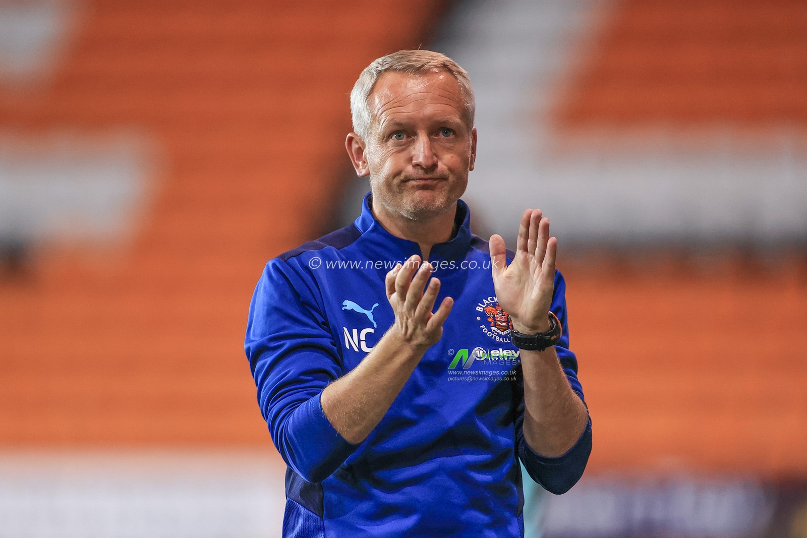 Neil Critchley Head Coach of Blackpool applauds his players