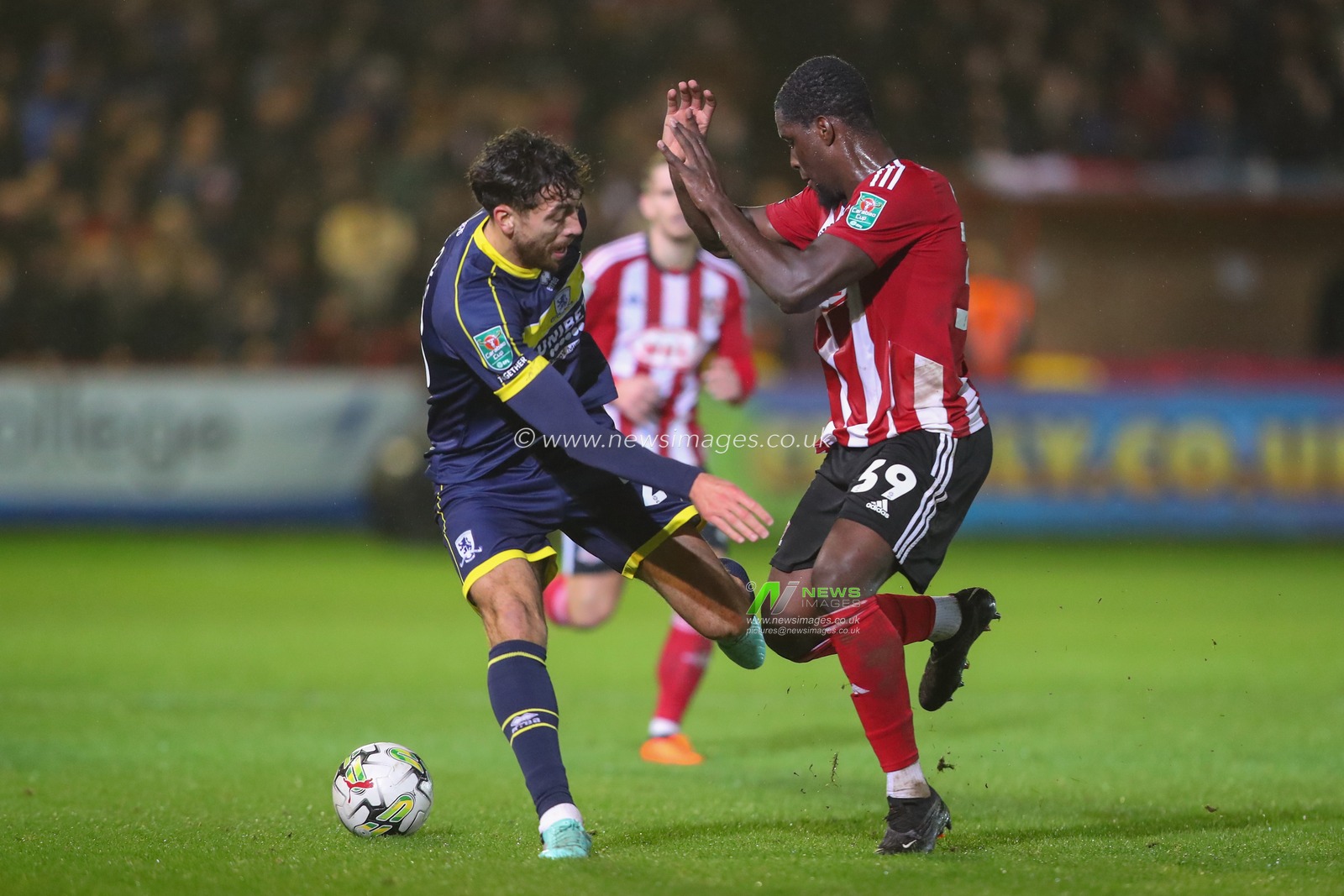 Cheick DiabatÃ© #39 of Exeter City tackles Matt Crooks #25 of Middlesbrough during the Carabao Cup match Exeter City vs Middlesbrough at St James' Park, Exeter, United Kingdom, 31st October 2023

(Photo by Gareth Evans/News Images)
