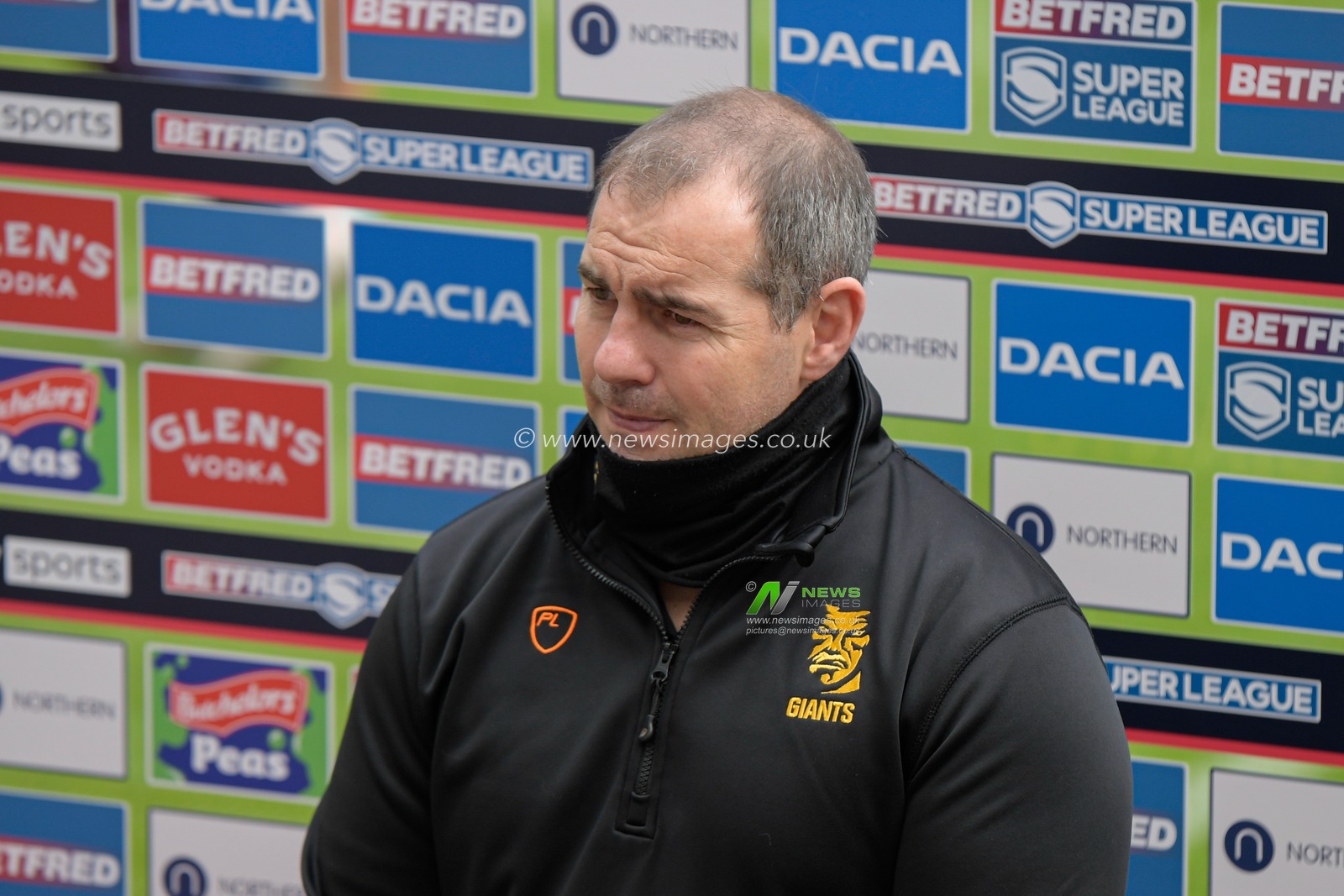 Ian Watson Head Coach of Huddersfield Giants speaks to the media before the game
