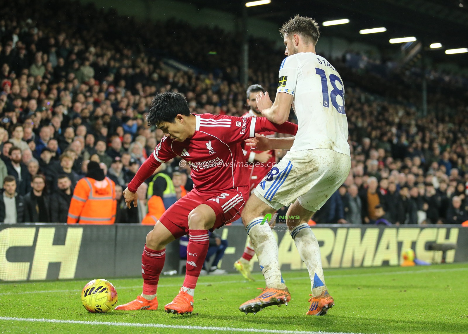 Wataru Endo of Liverpool holds off Anton Stach of Leeds United during the Premier League match Leeds United vs Liverpool at Elland Road, Leeds, United Kingdom, 6th December 2025

(Photo by Richard Bierton/News Images)

*** GER AUT SUI OUT ***