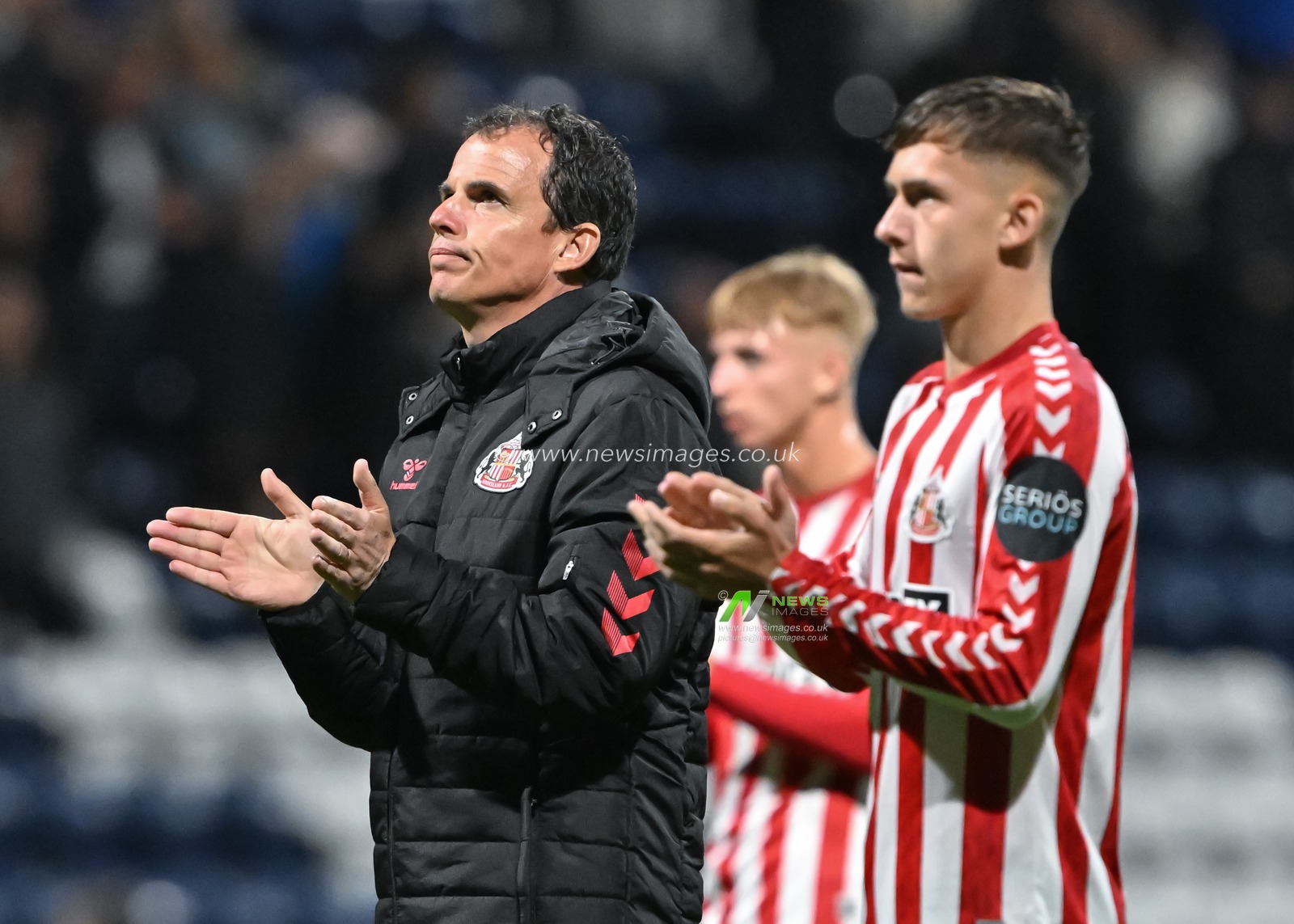RÃ©gis Le Bris Head Coach of Sunderland claps fans at full time during the Carabao Cup match Preston North End vs Sunderland at Deepdale, Preston, United Kingdom, 13th August 2024

(Photo by Cody Froggatt/News Images)