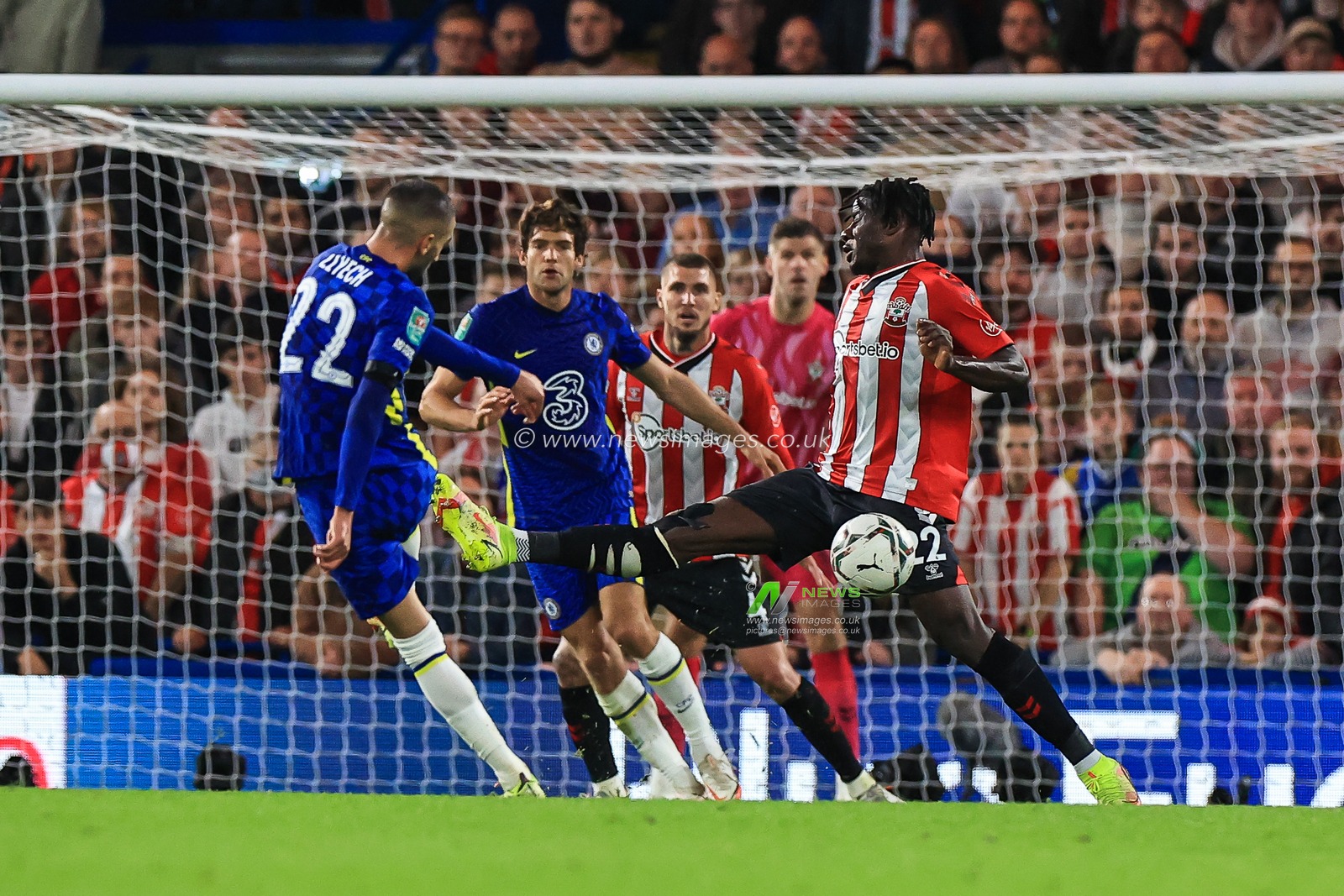 Hakim Ziyech #22 of Chelsea shot on goal is blocked by Mohammed Salisu #22 of Southampton