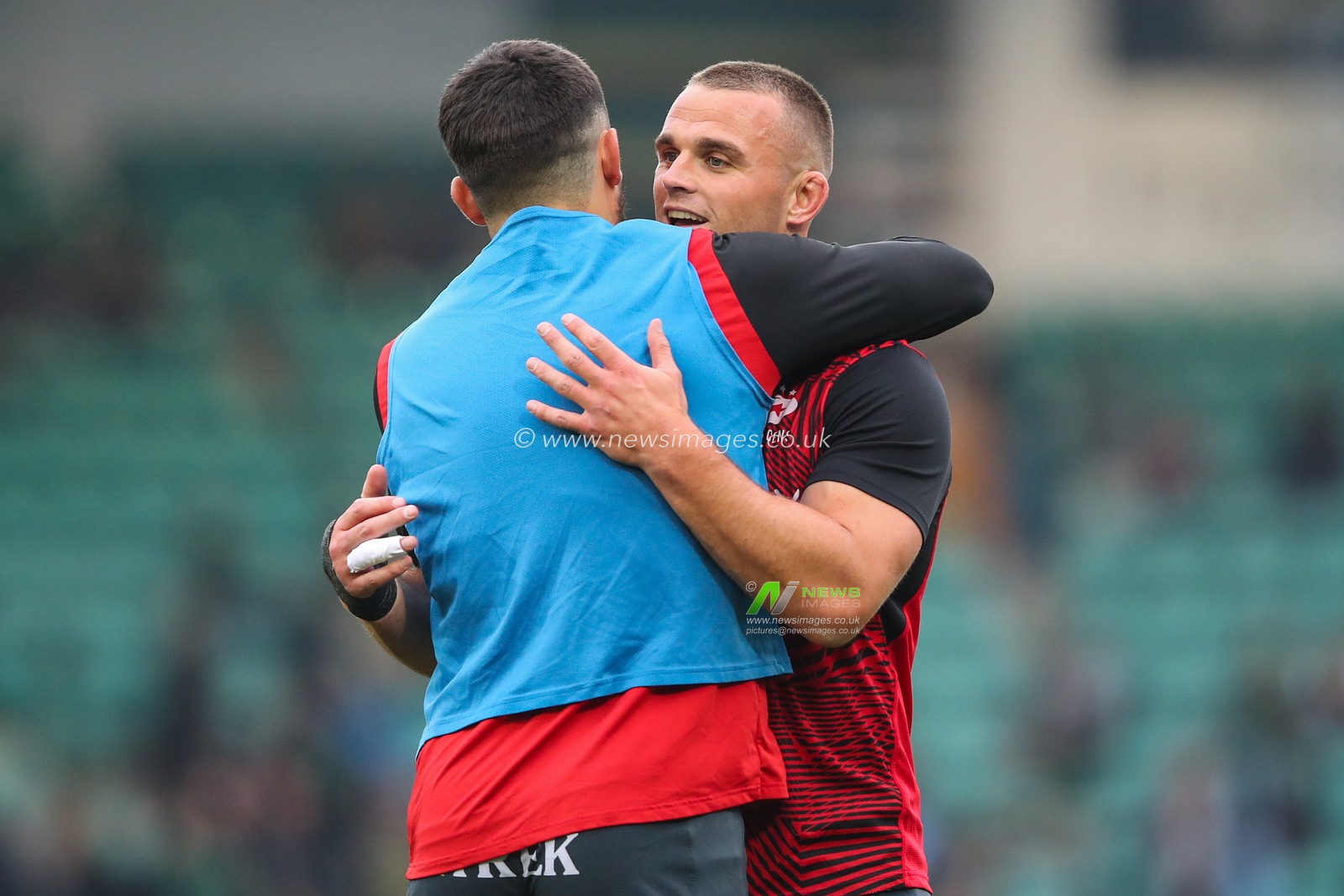 Ben Earl of Saracens embraces his teammate during during pre match warm up the Gallagher Premiership Play-off Semi-final match Northampton Saints vs Saracens at Cinch Stadium at Franklin's Gardens, Northampton, United Kingdom, 31st May 2024

(Photo by Gareth Evans/News Images)