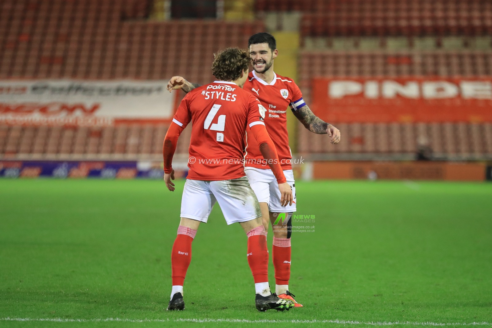 Alex Mowatt #27 of Barnsley celebrates his goal to make it 1-1 with Callum Styles #4 of Barnsley