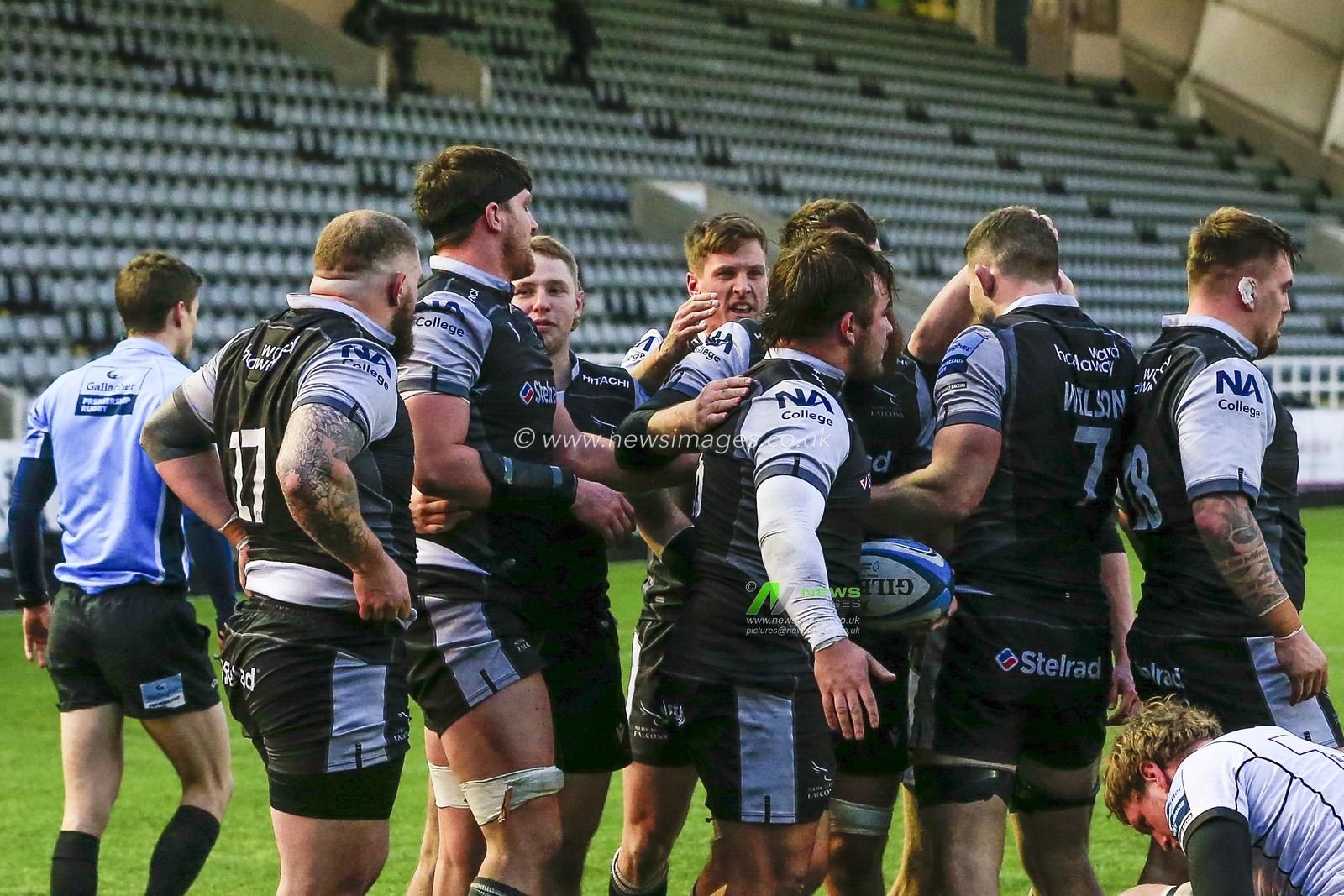 George McGuigan of Newcastle Falcons celebrates his try with his teammates