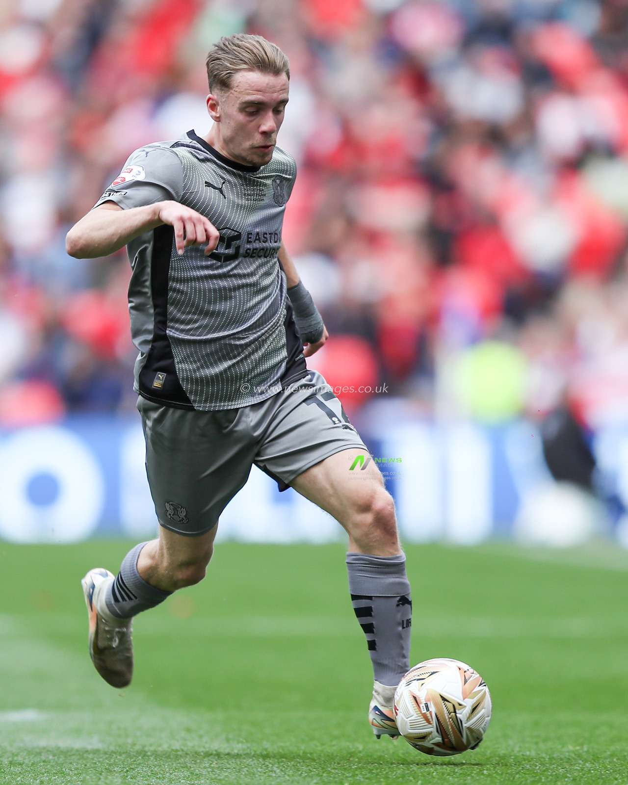 Jack Currie of Leyton Orient with ball at his feet during the Sky Bet League 1 Playoff Final match Charlton Athletic vs Leyton Orient at Wembley Stadium, London, United Kingdom, 25th May 2025

(Photo by Jorge Horsted/News Images)