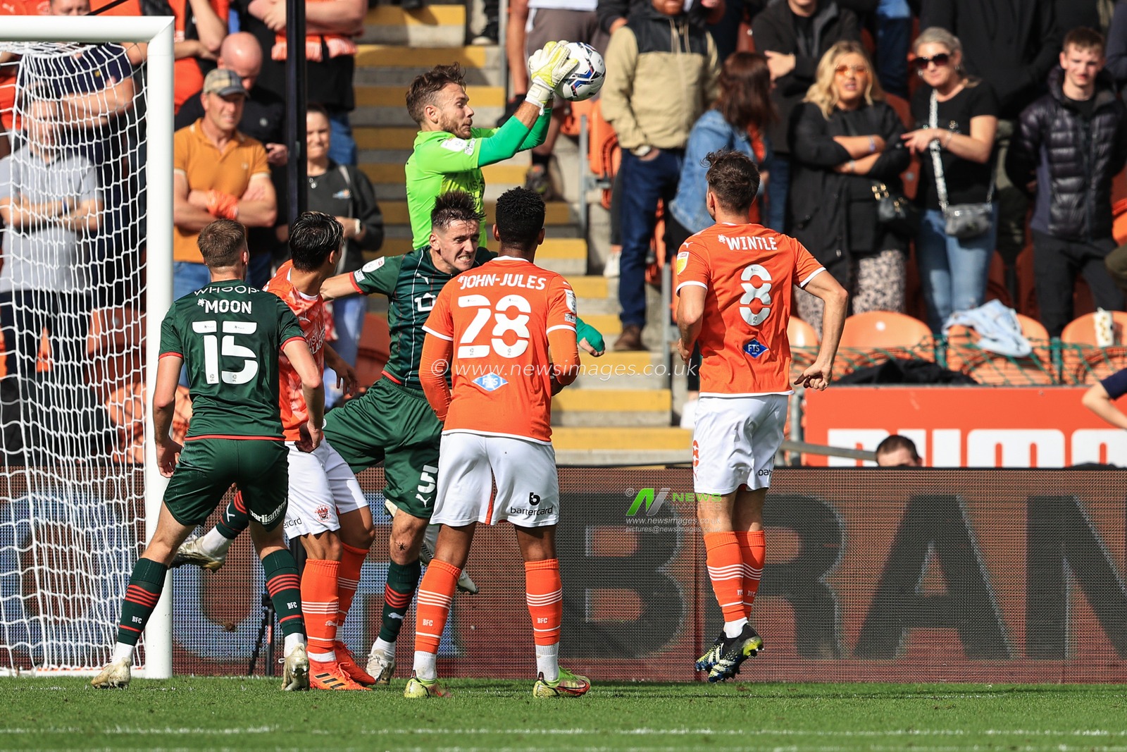 Chris Maxwell #1 of Blackpool collects the ball
