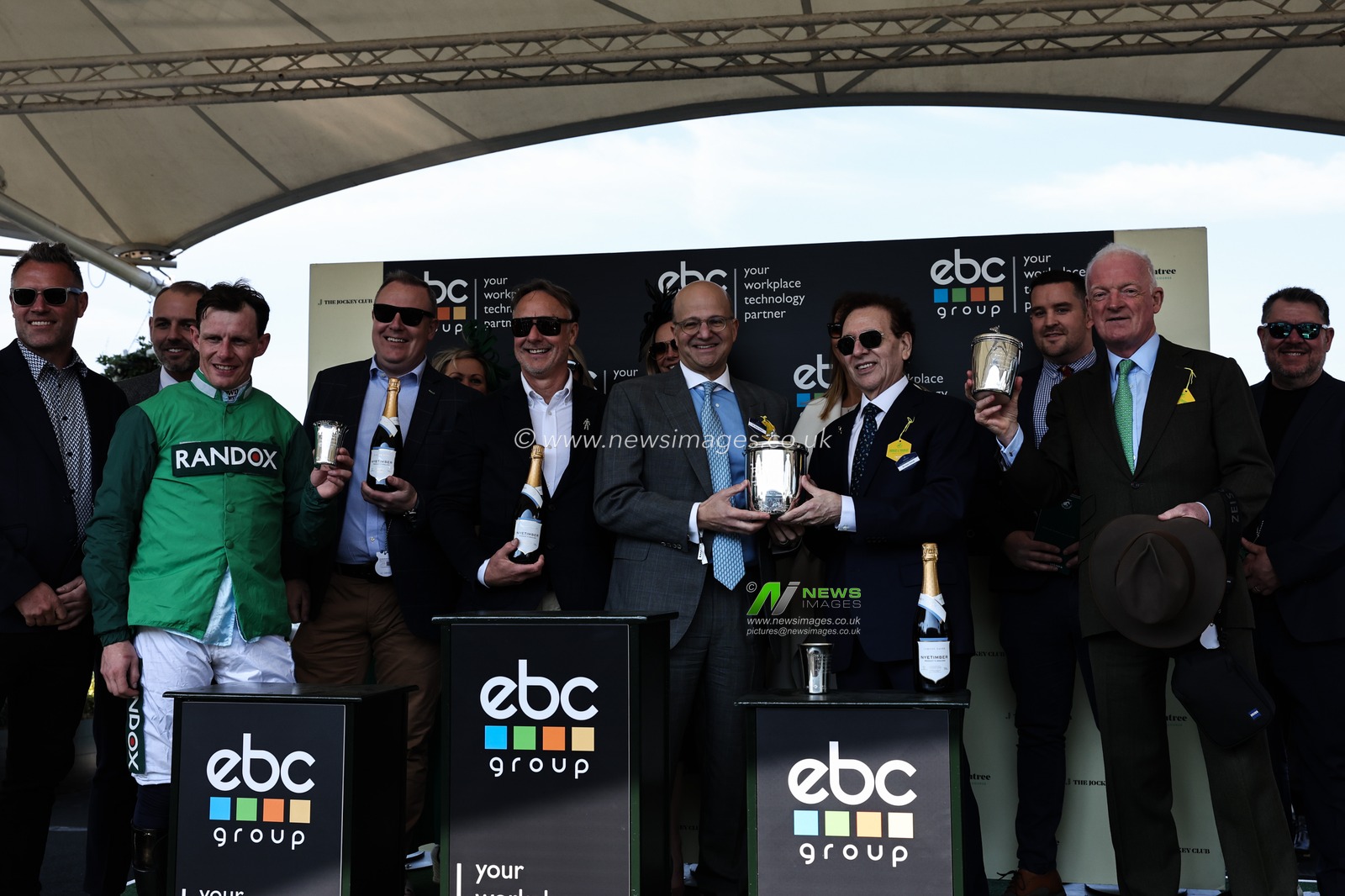 Paul Townend and Willie Mullins with trophy after winning the EBC Group Manifesto Novices' Chase during the Randox Grand National 2025 Day 1 Opening Day at Aintree Racecourse, Liverpool, United Kingdom, 3rd April 2025

(Photo by Mark Cosgrove/News Images)
