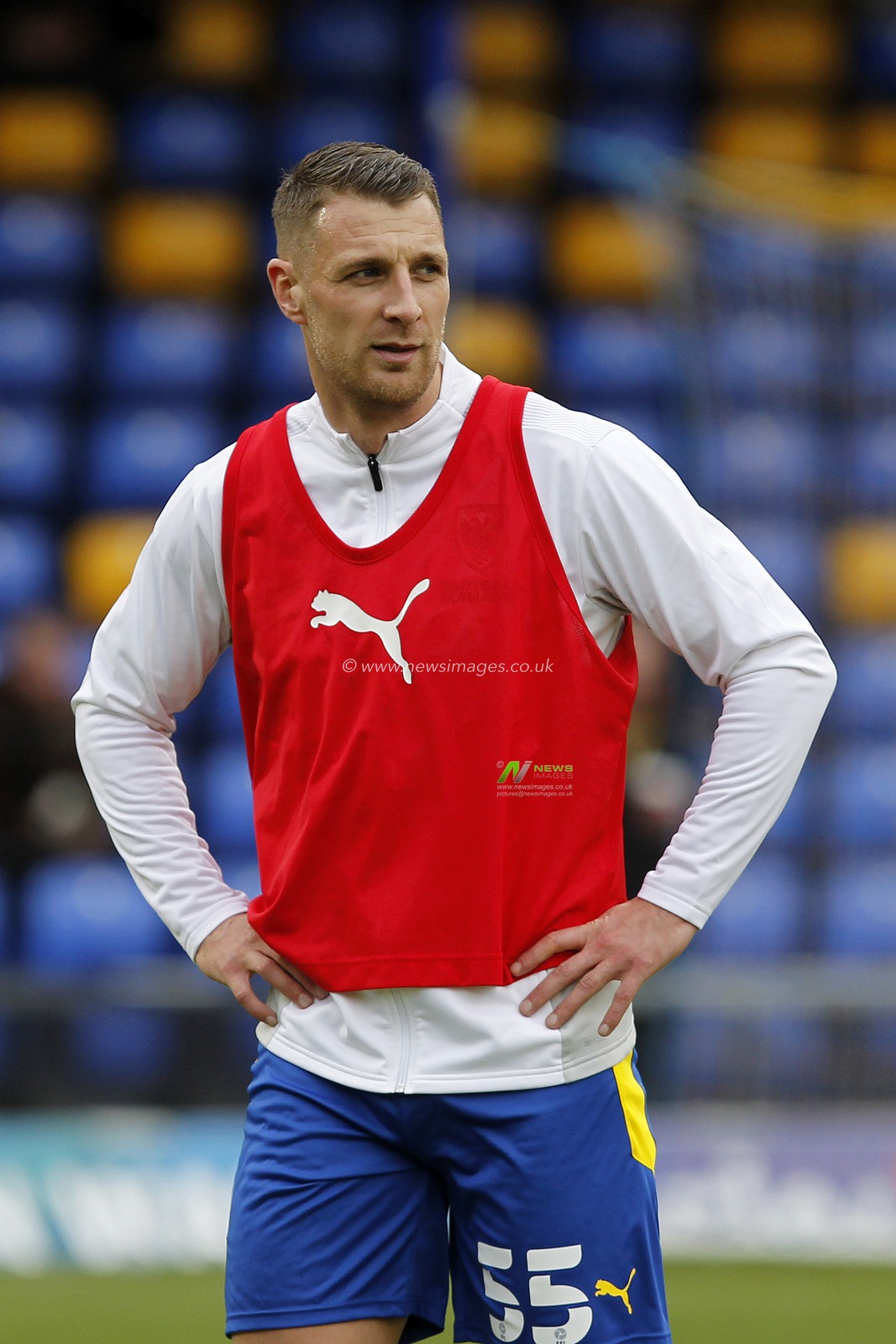 Lee Brown of #55 of AFC Wimbledon warms up