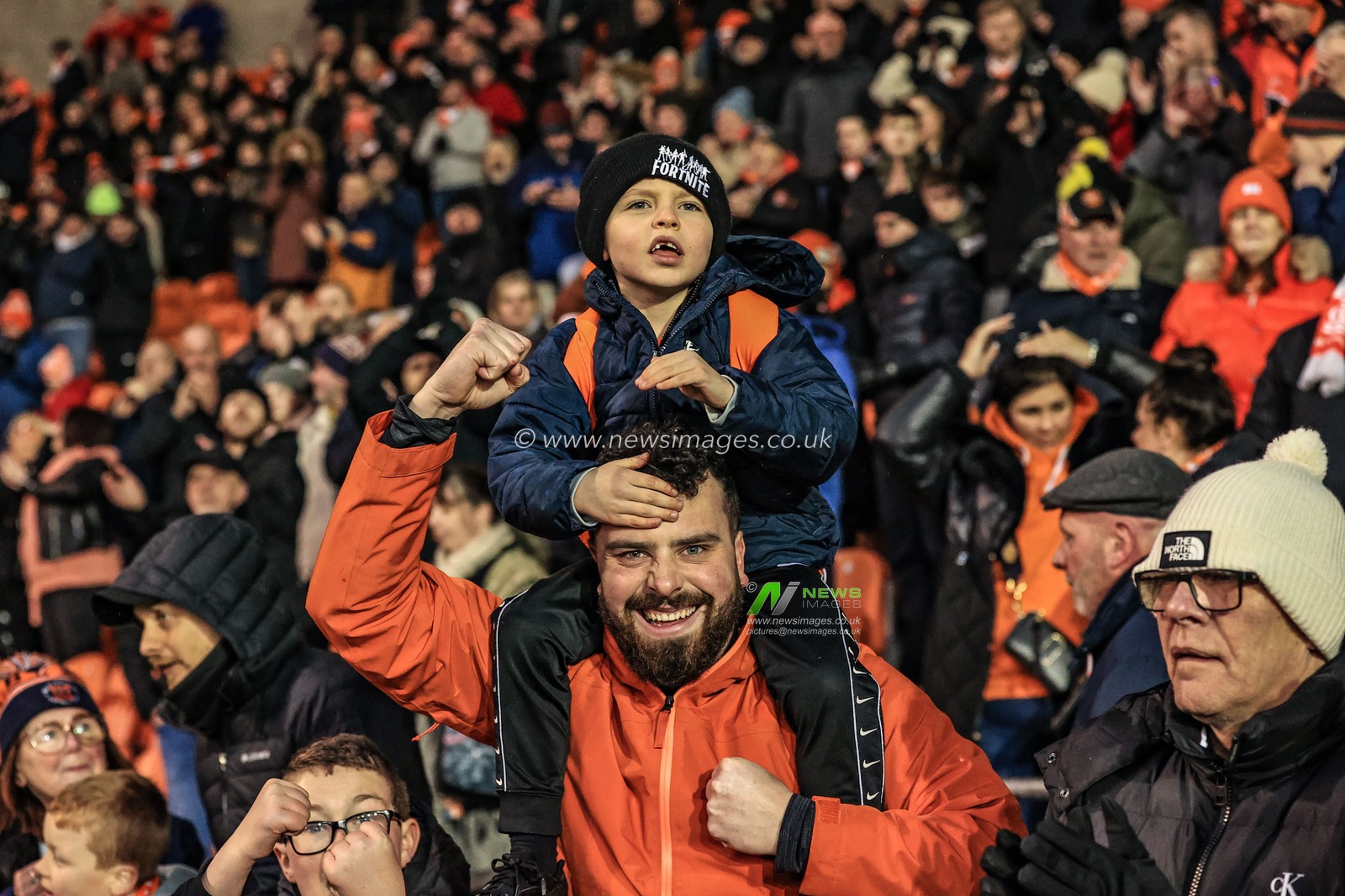 A young Blackpool fan and his dadâ€™s eyes as they celebrate Blackpools 3-1 win over Bristol City