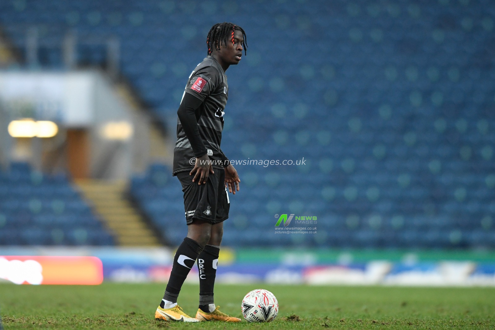Taylor Richards #17 of Doncaster Rovers prepares to take a free kick