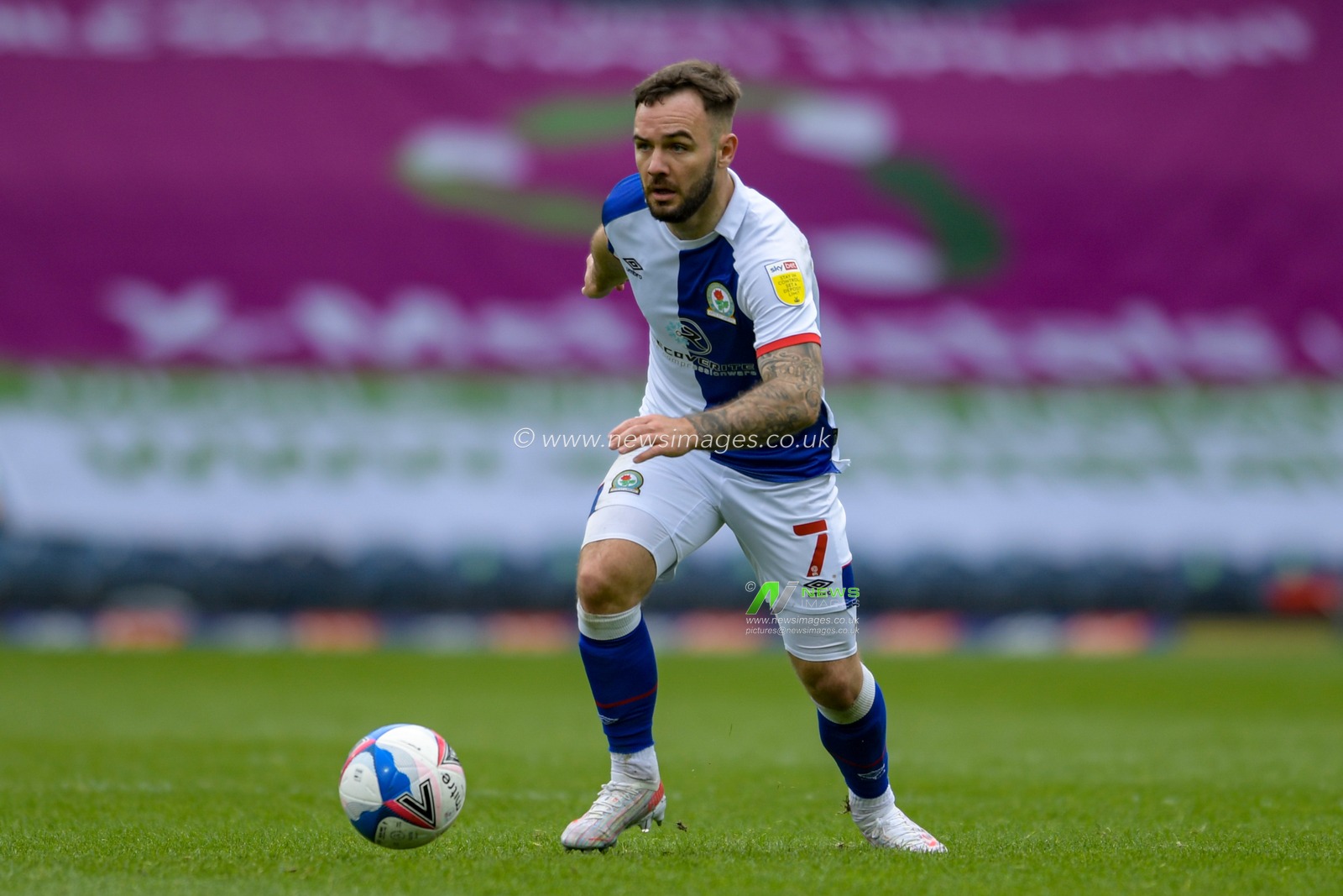 Adam Armstrong #7 of Blackburn Rovers runs forward with the ball