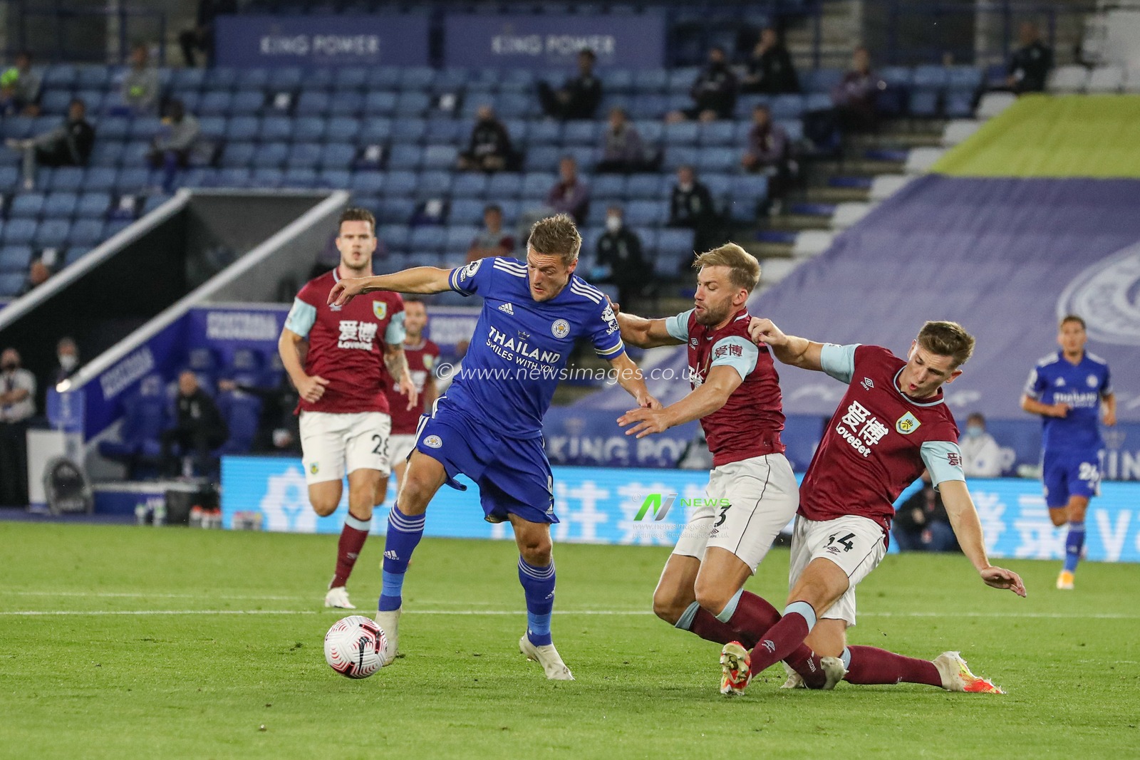 Jamie Vardy (9) of Leicester City holds the ball inside the area as Charlie Taylor (3) of Burnley tries to hold him off