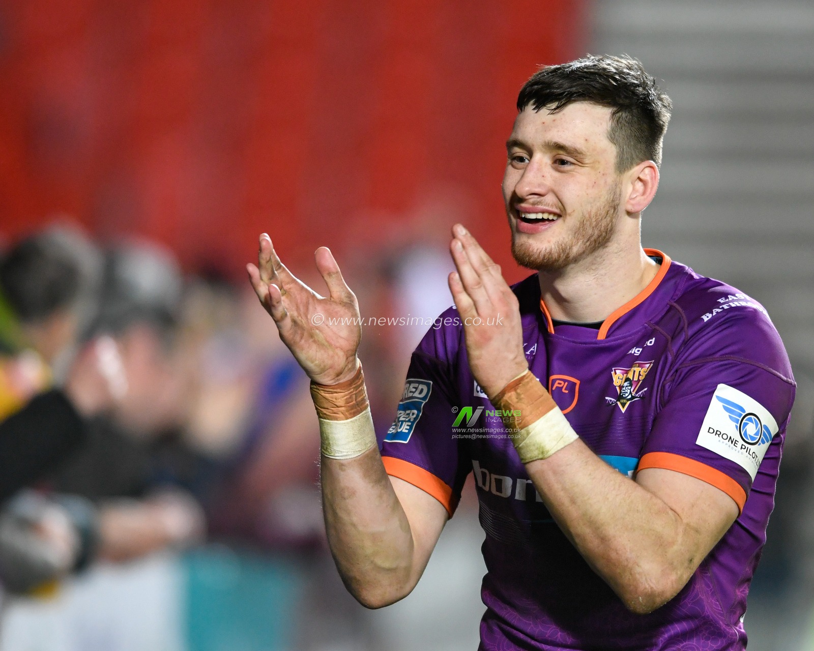 6th March 2020, Totally Wicked Stadium, St Helens, England; Betfred Super League, Saint Helens v Huddersfield Giants : Sam Wood (27) of Huddersfield Giants applauds the travelling supporters at the end of the game