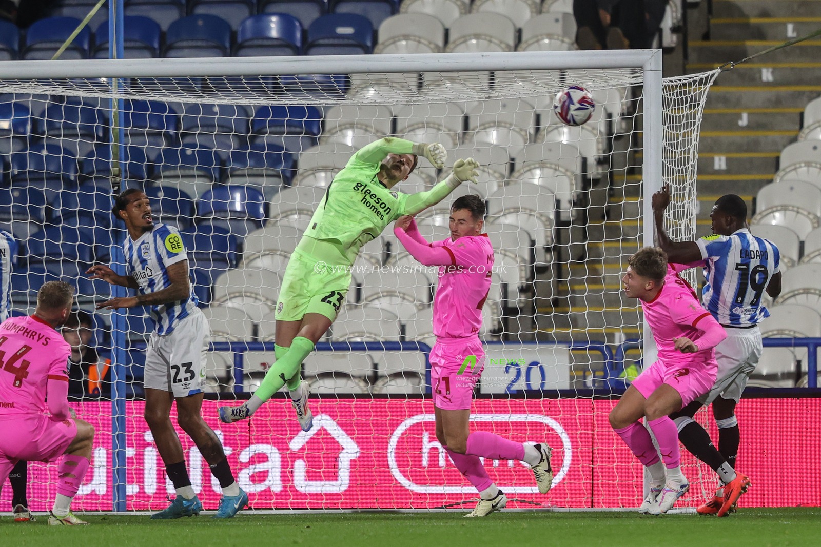 Ben Killip of Barnsley punches the ball clear from a corner during the Bristol Street Motors Trophy match Huddersfield Town vs Barnsley at John Smith's Stadium, Huddersfield, United Kingdom, 8th October 2024

(Photo by Alfie Cosgrove/News Images)
