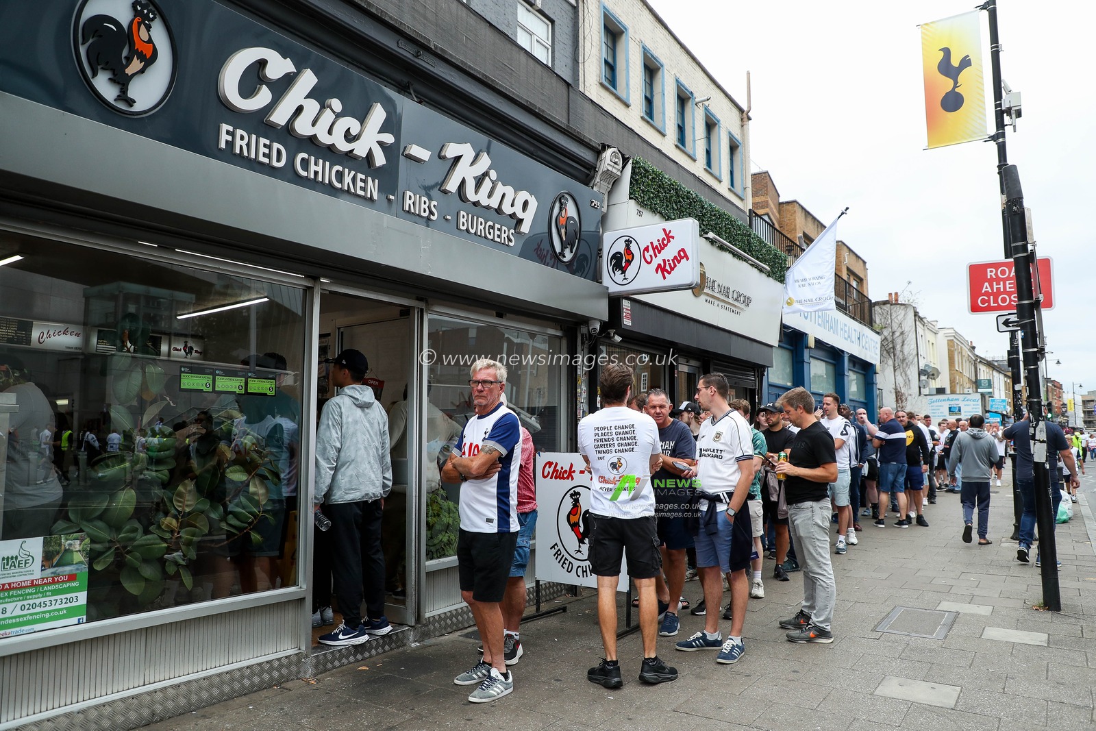 Fans queue outside Chick-King prior to the Premier League match Tottenham Hotspur vs Burnley at Tottenham Hotspur Stadium, London, United Kingdom, 16th August 2025

(Photo by Izzy Poles/News Images)