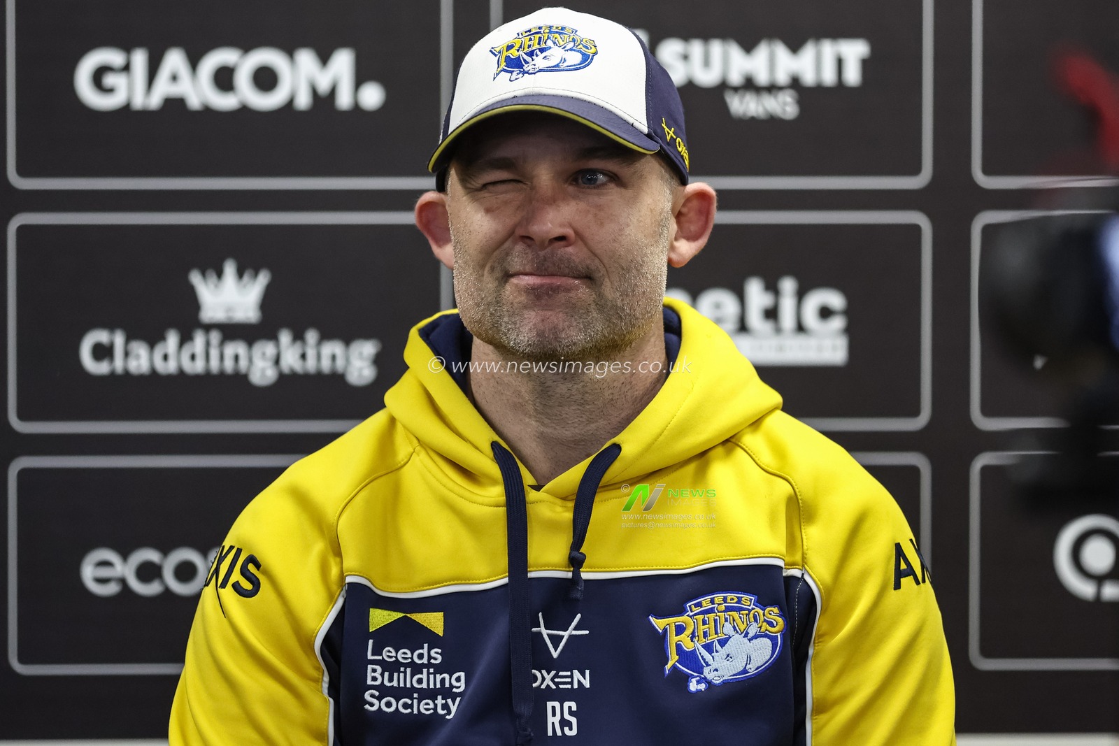 Rohan Smith Head Coach of Leeds Rhinos winks in the post mach press conference during the Betfred Super League Round 9 match Hull FC vs Leeds Rhinos at MKM Stadium, Hull, United Kingdom, 28th April 2024

(Photo by Mark Cosgrove/News Images)