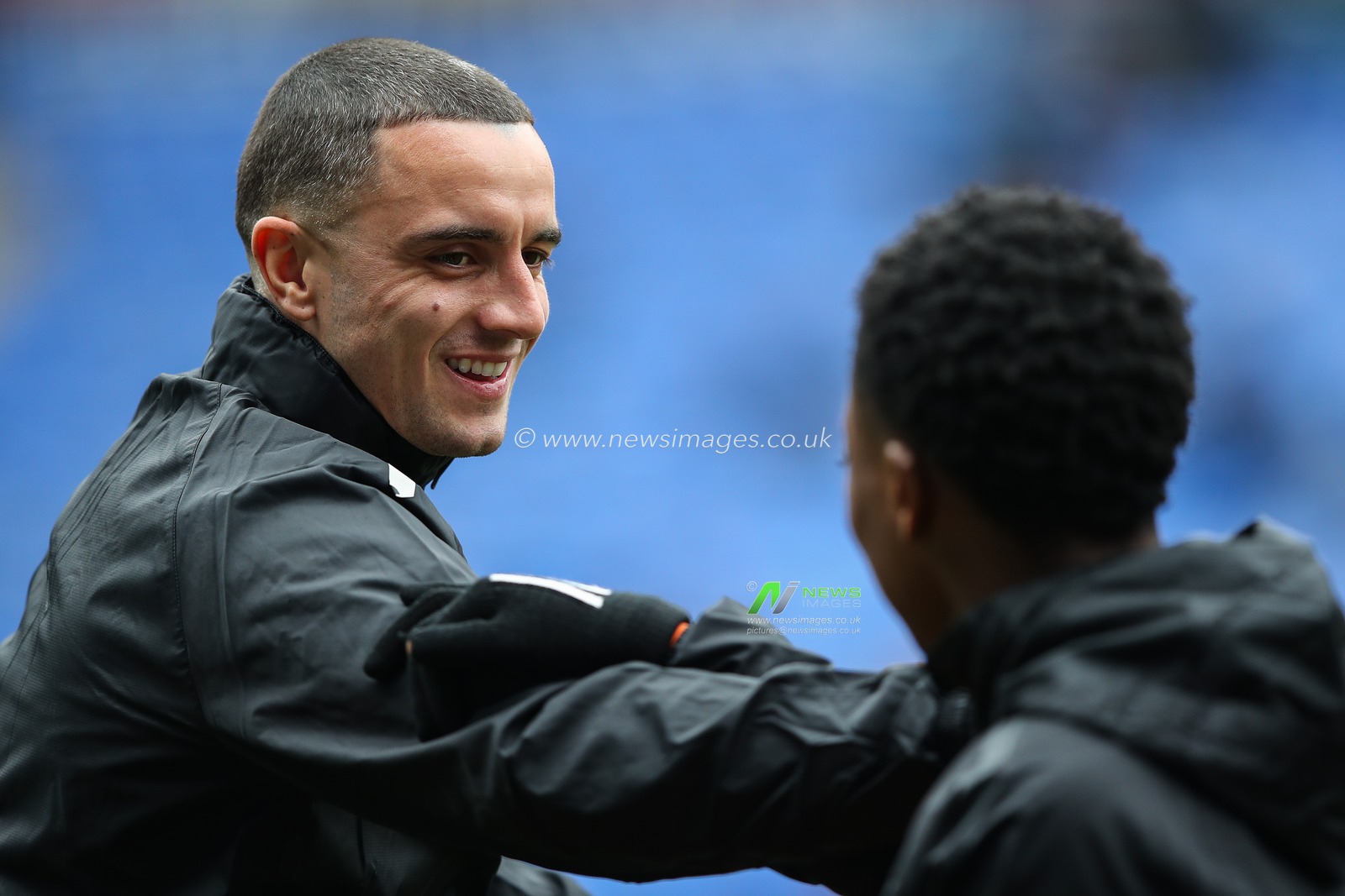 Oliver Norburn of Blackpool talks with Karamoko Dembele of Blackpool during the pre-game warm up ahead of the Sky Bet League 1 match Reading vs Blackpool at Select Car Leasing Stadium, Reading, United Kingdom, 27th April 2024

(Photo by Gareth Evans/News Images)