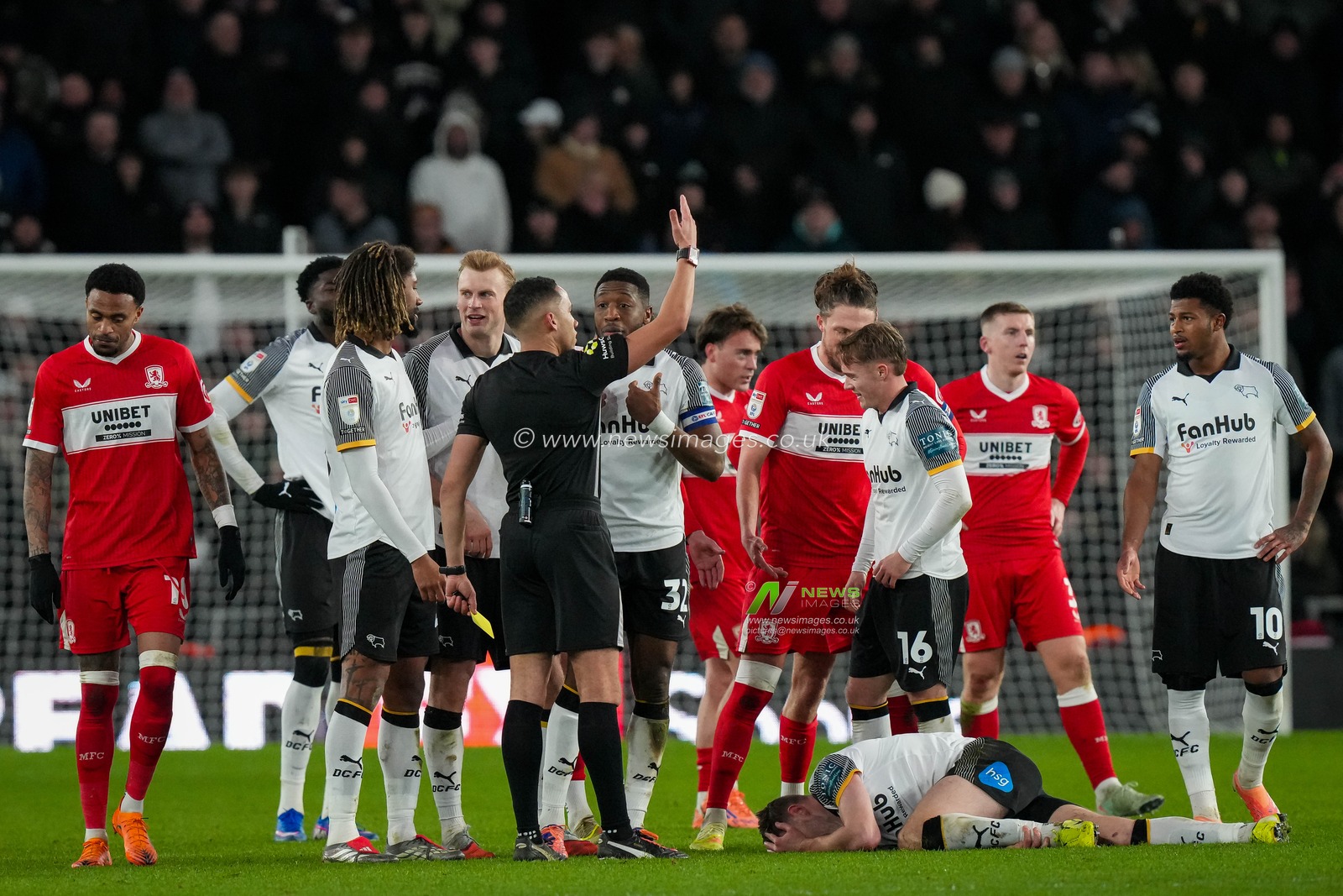 Referee Andrew Kitchen Salisbury calls for medics on the field  during the Sky Bet Championship match Derby County vs Middlesbrough at Pride Park Stadium, Derby, United Kingdom, 1st January 2026

(Photo by Maynard Manyowa/News Images)

*** GER AUT SUI OUT ***