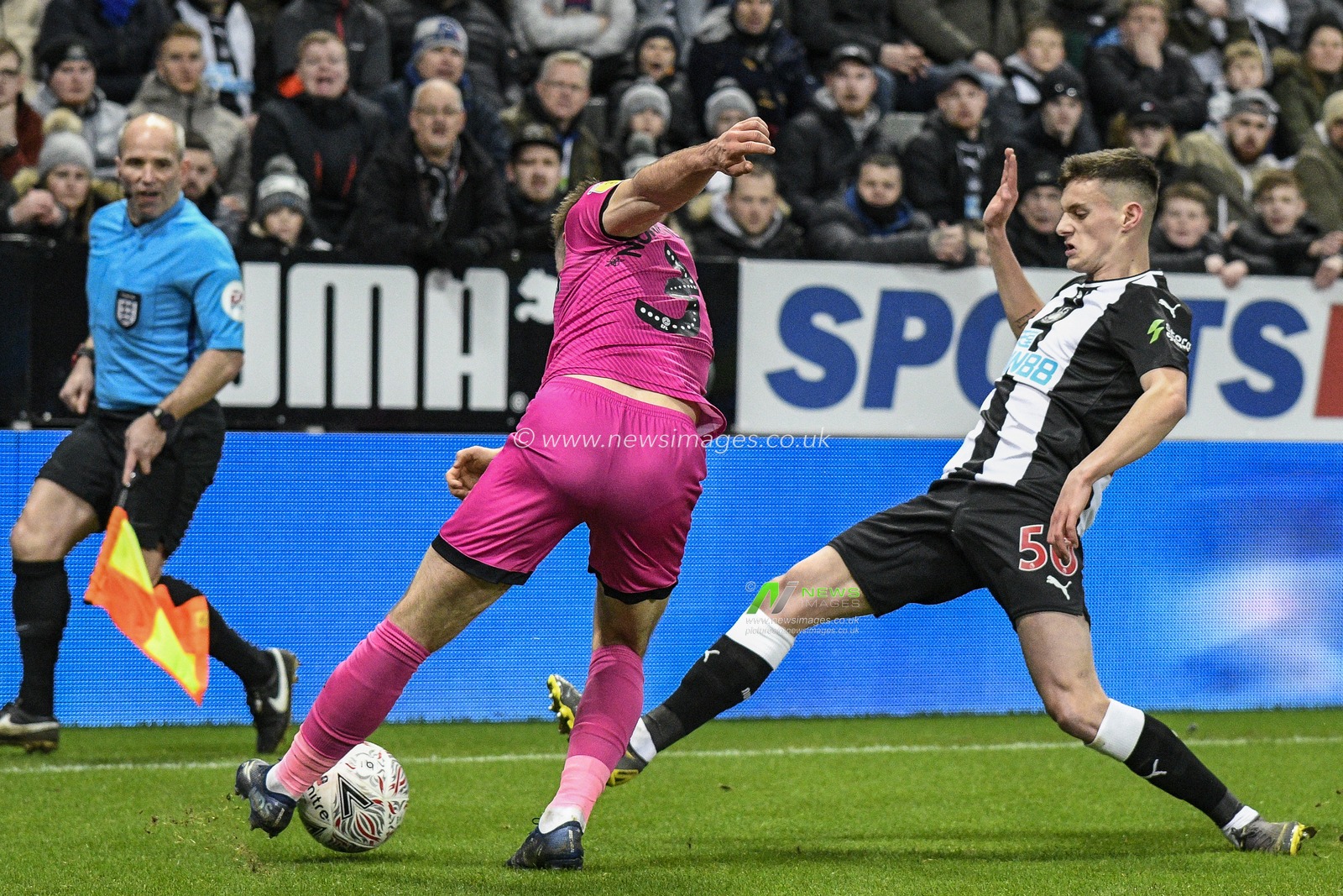 14th January 2020, St. James's Park, Newcastle, England; Emirates FA Cup, Newcastle United v Rochdale : Tom Allan (50) of Newcastle United battles for possession with Rhys Norrington-Davies (3) of Rochdale

Credit: Iam Burn/News Images