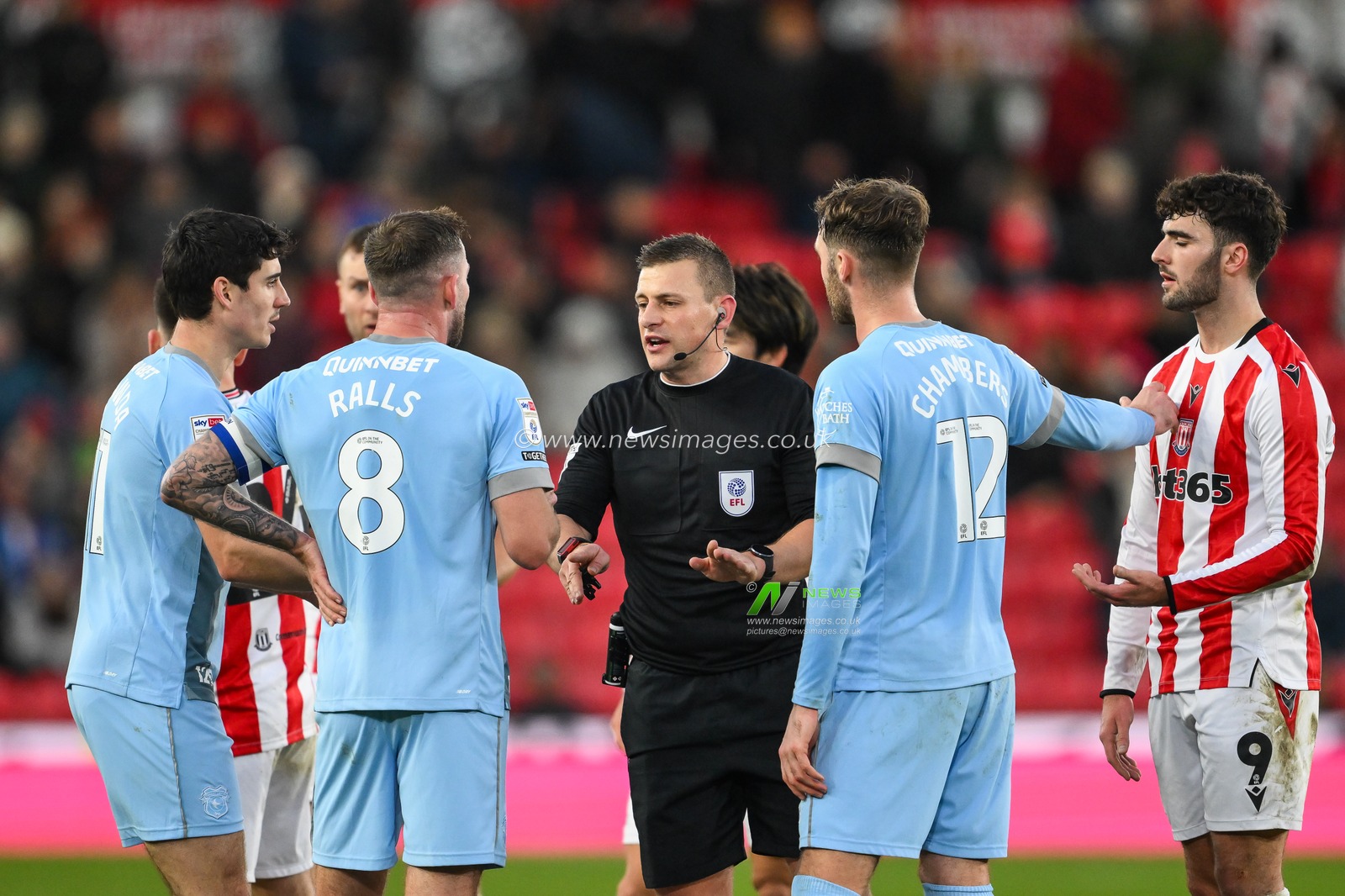 Referee Josh Smith speaks to Joe Ralls of Cardiff City during the Sky Bet Championship match Stoke City vs Cardiff City at Bet365 Stadium, Stoke-on-Trent, United Kingdom, 14th December 2024

(Photo by Craig Thomas/News Images)