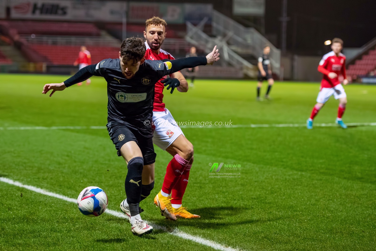 Zach Clough #7 of Wigan Athletic controls the ball