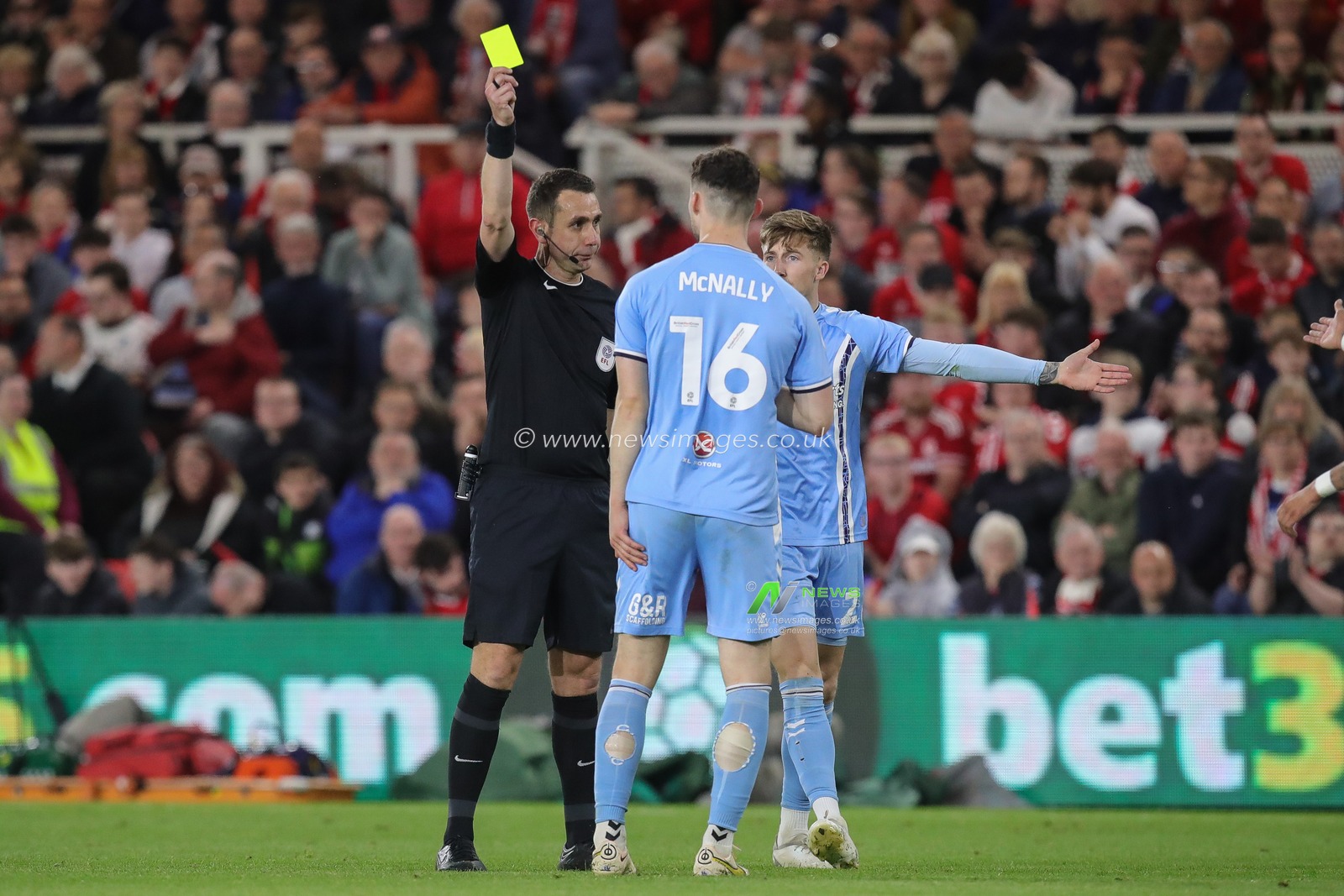 Referee Robert Madley awards a yellow card to Luke McNally #16 of Coventry City during the Sky Bet Championship Play-Off match Middlesbrough vs Coventry City at Riverside Stadium, Middlesbrough, United Kingdom, 17th May 2023

(Photo by James Heaton/News Images)
