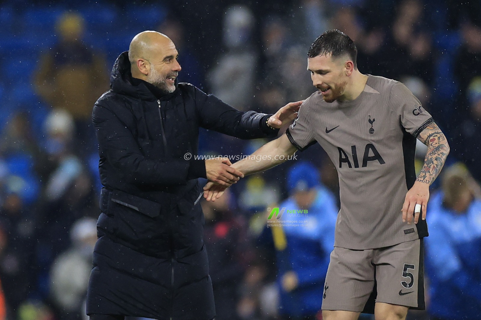 Pep Guardiola the Manchester City manager and Pierre-Emile Hojbjerg #5 of Tottenham Hotspur at the end of the Premier League match Manchester City vs Tottenham Hotspur at Etihad Stadium, Manchester, United Kingdom, 3rd December 2023

(Photo by Conor Molloy/News Images)