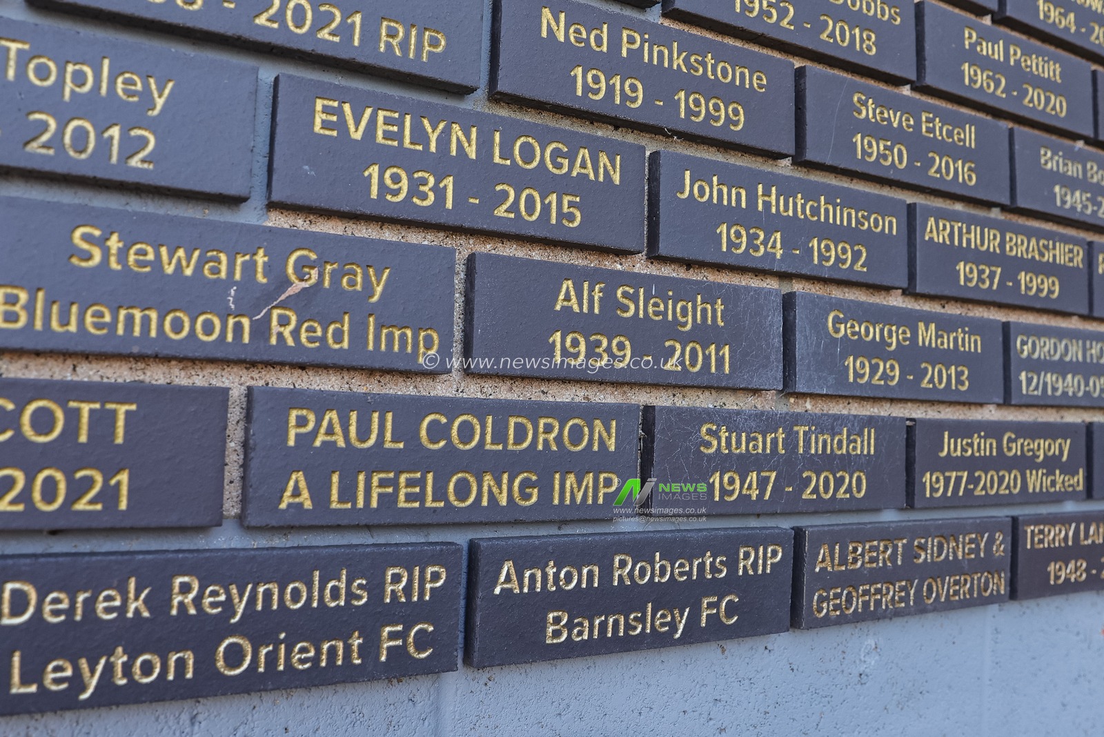 Lincoln City place a memorial plaque in memory of Barnsley FC fan Anton Roberts who sadly passed away at a Lincoln Barnsley game last season  during the Sky Bet League 1 match Lincoln City vs Barnsley at Gelder Group Sincil Bank Stadium, Lincoln, United Kingdom, 25th November 2023

(Photo by Mark Cosgrove/News Images)