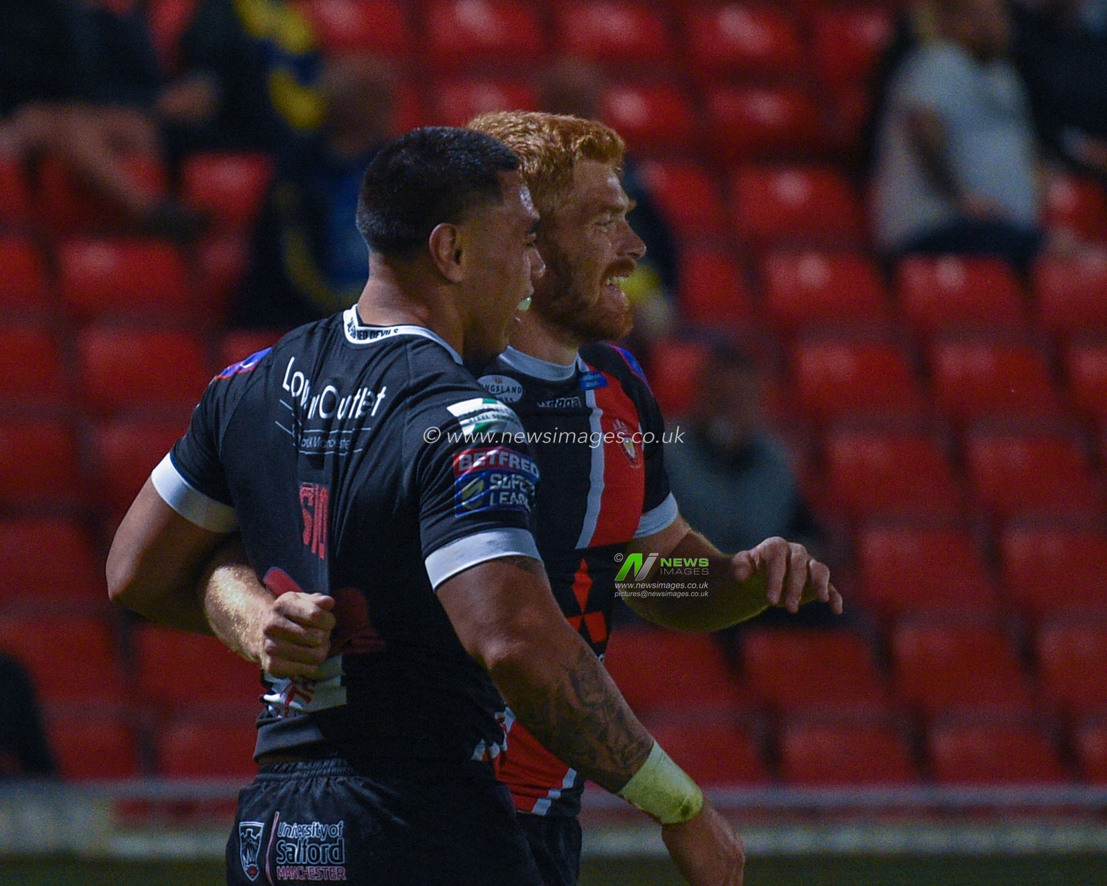 29th August 2019 ,  AJ Bell Stadium, Salford, England;  Betfred Super League Rugby, Round 27, Salford Red Devils vs Warrington Wolves ; Ken Sio (23) of Salford Red Devils celebrates scoring his try making it 6-0

Credit: Richard Long/News Images